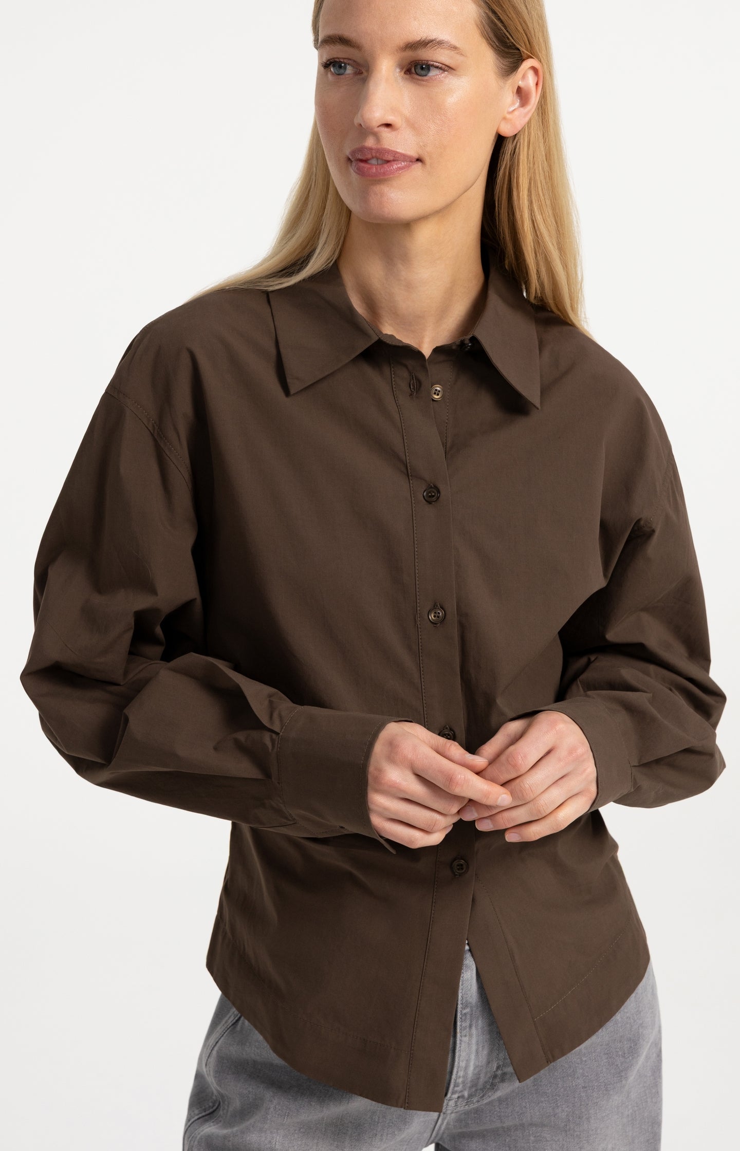 Blouse with waist accent and pleat detail