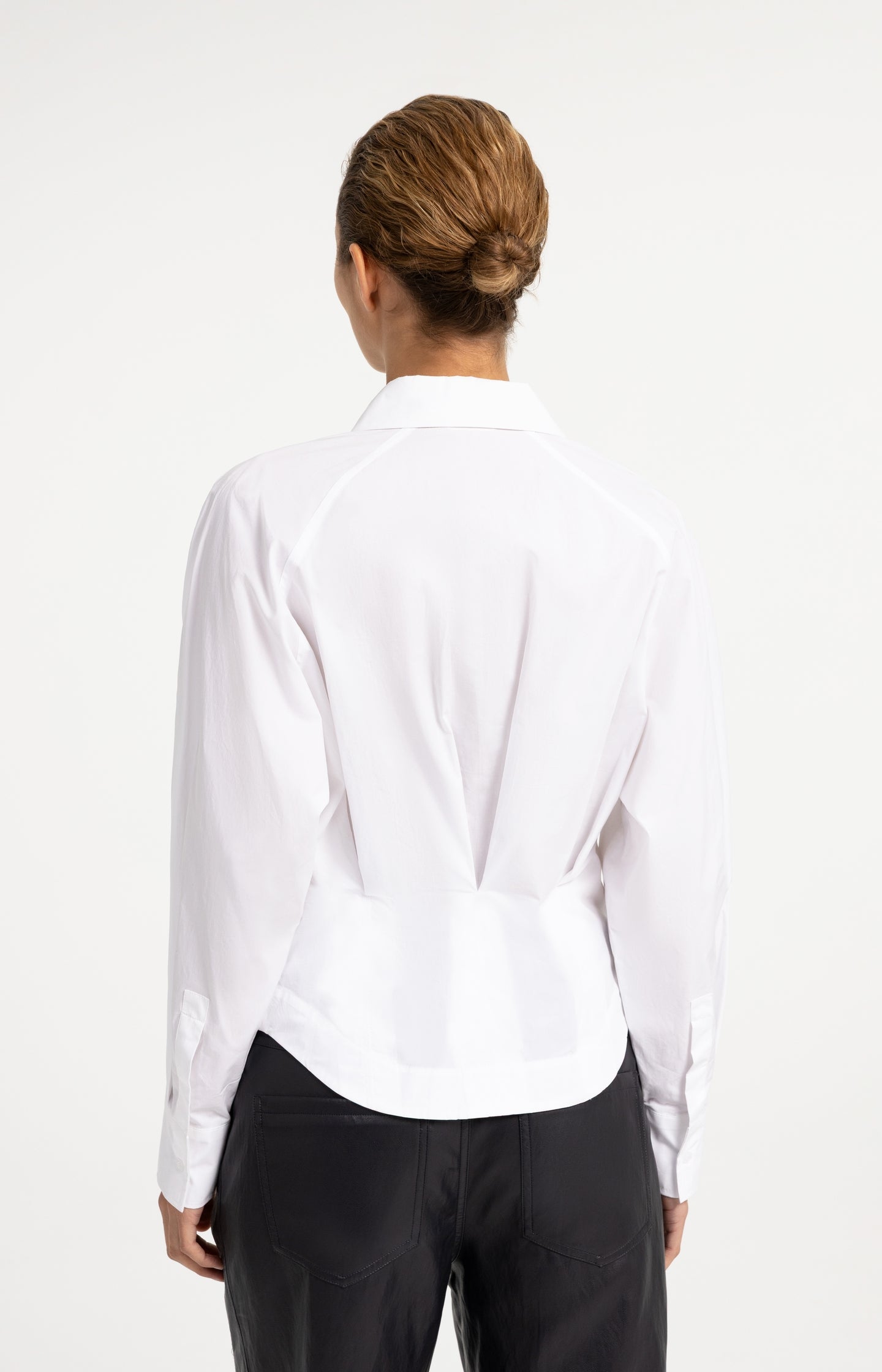 Blouse with waist accent and pleat detail