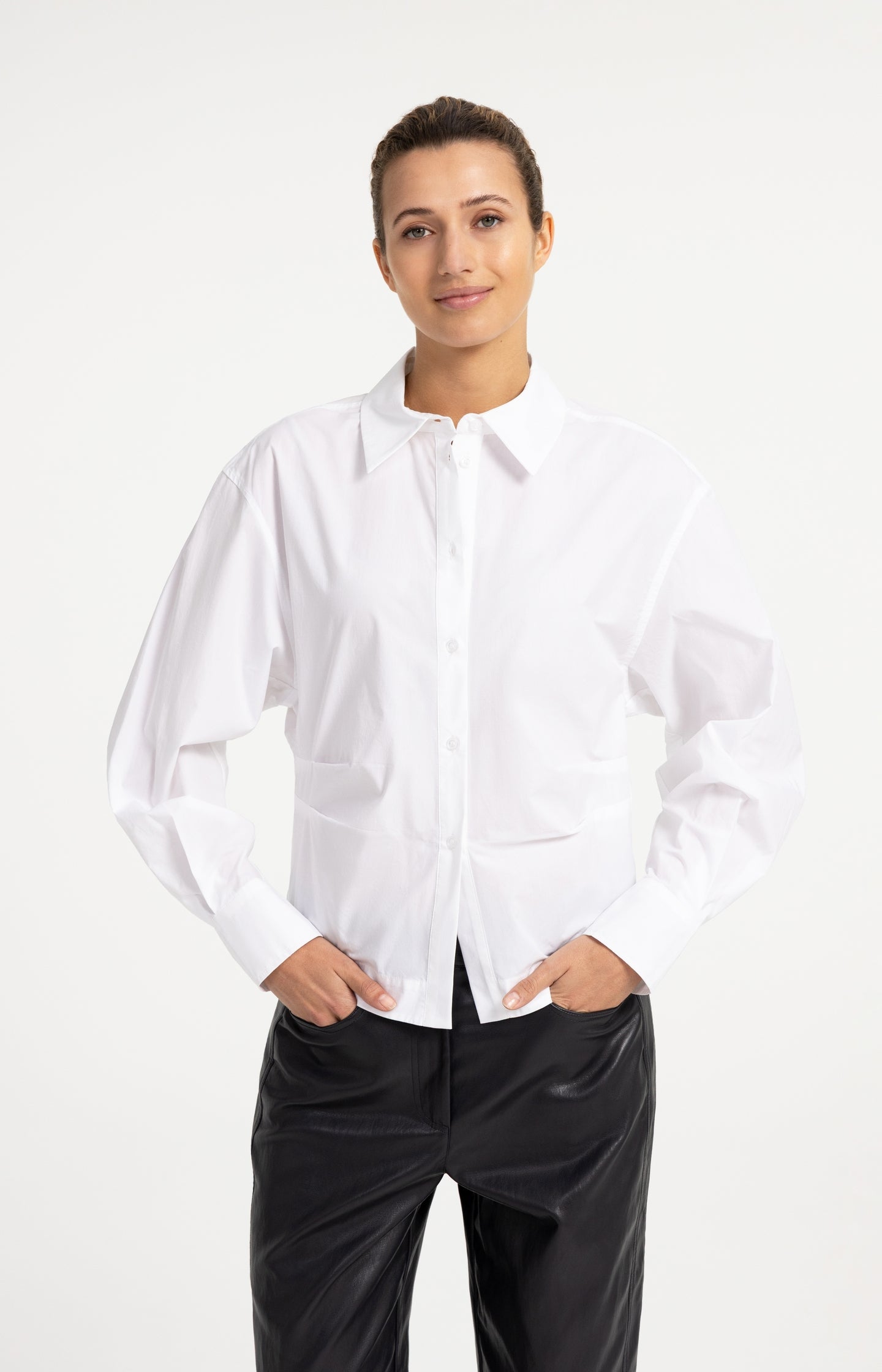 Blouse with waist accent and pleat detail