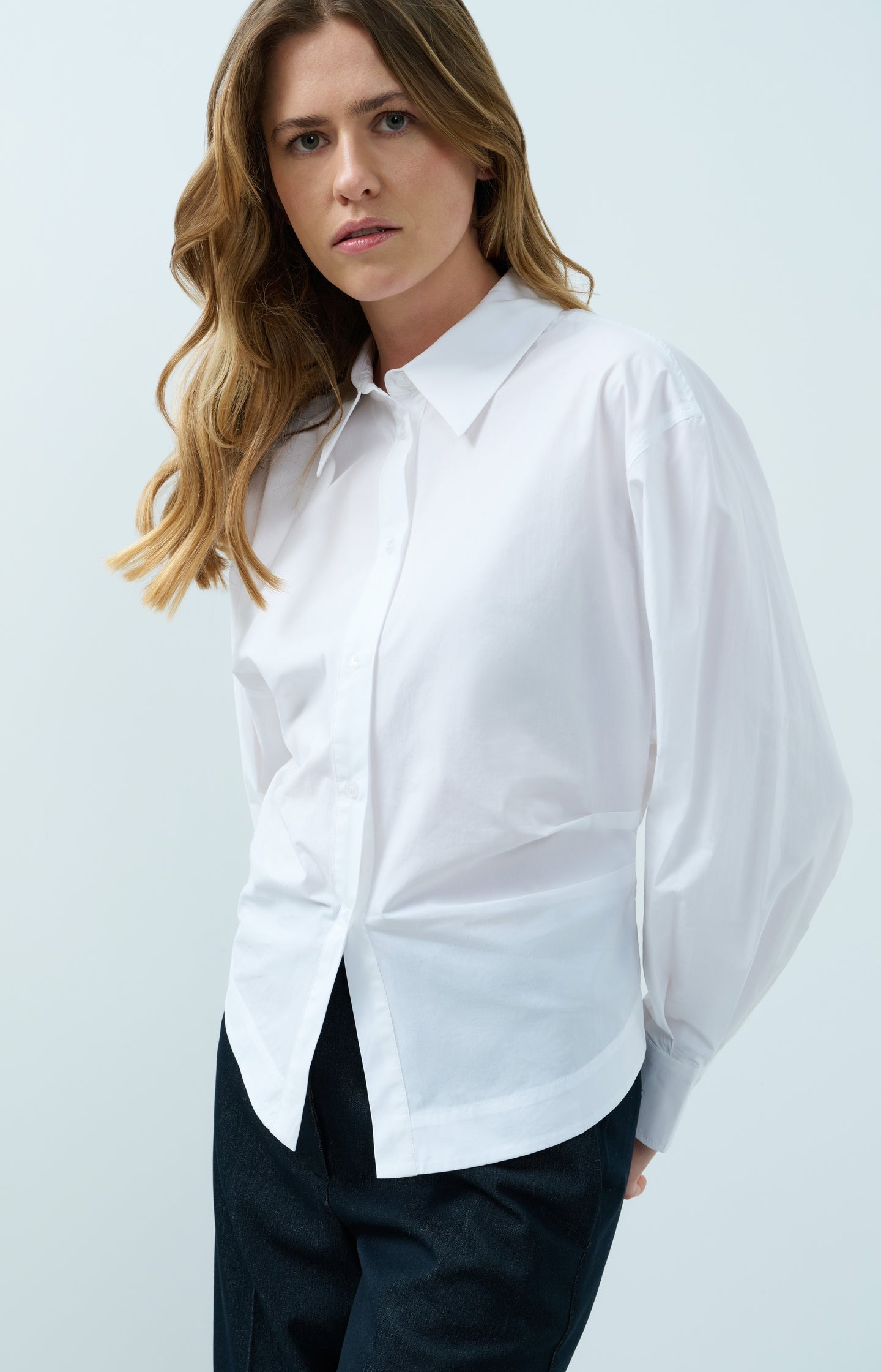 Blouse with waist accent and pleat detail