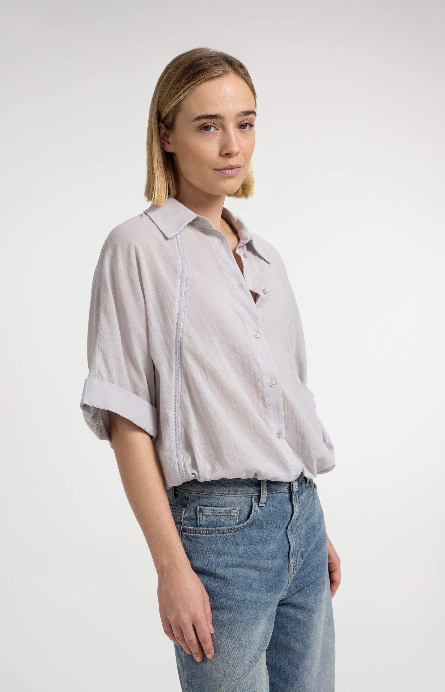 Blouse with wide sleeves and braided details