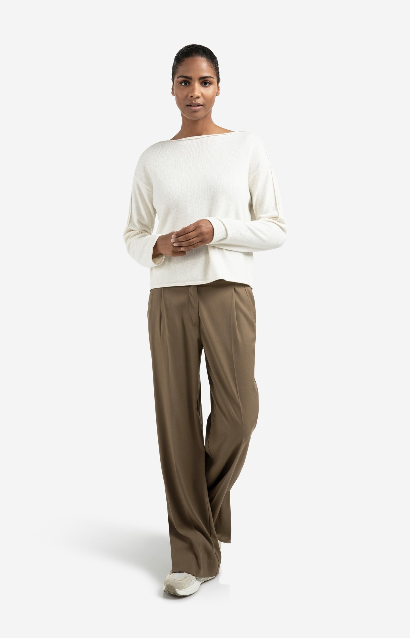 Boat neck sweater with refined decorative seams