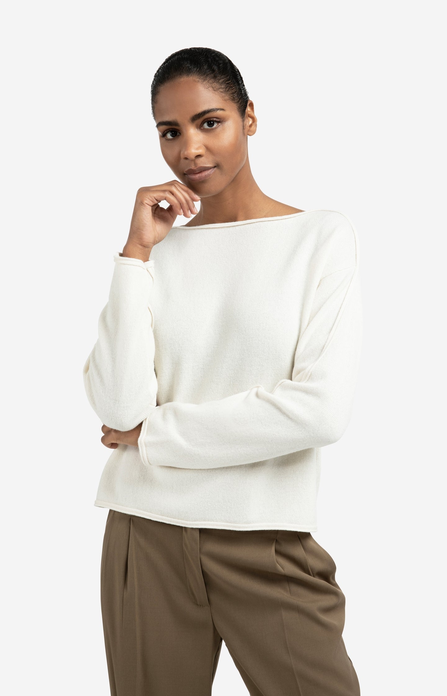 Boat neck sweater with refined decorative seams