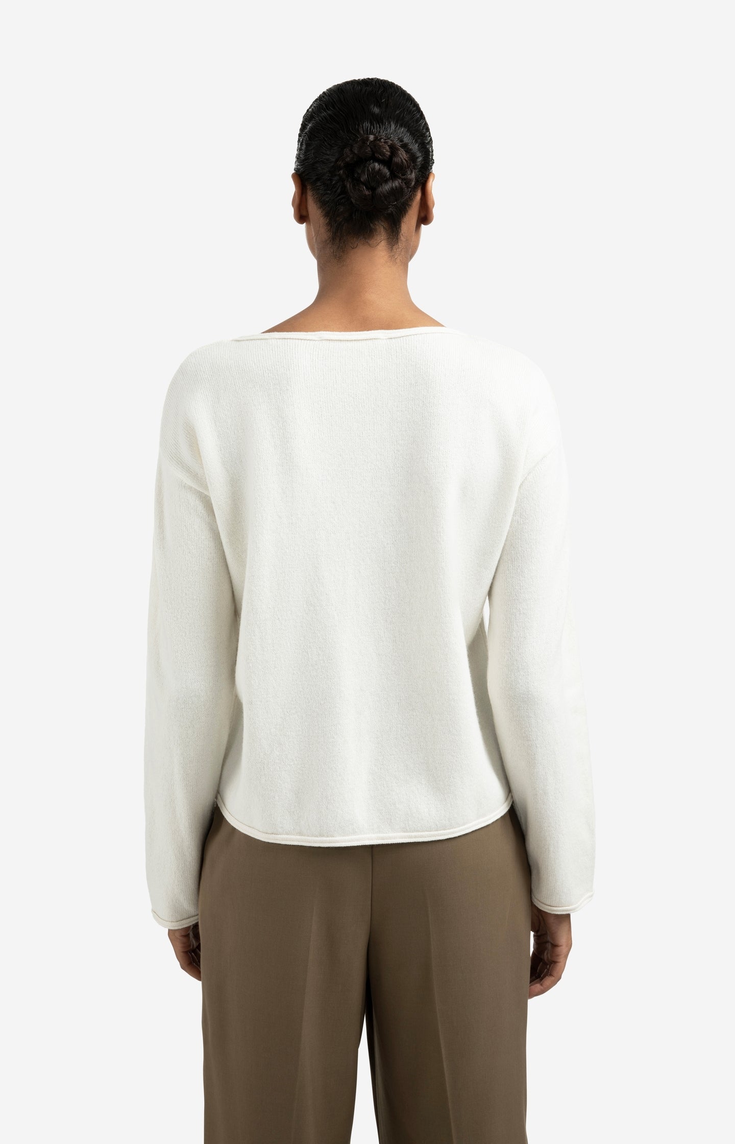 Boat neck sweater with refined decorative seams