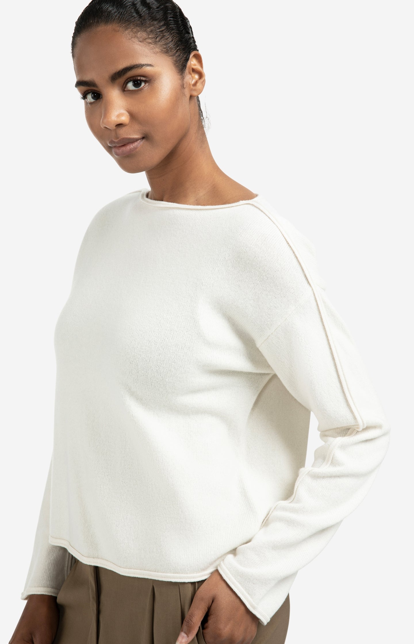 Boat neck sweater with refined decorative seams