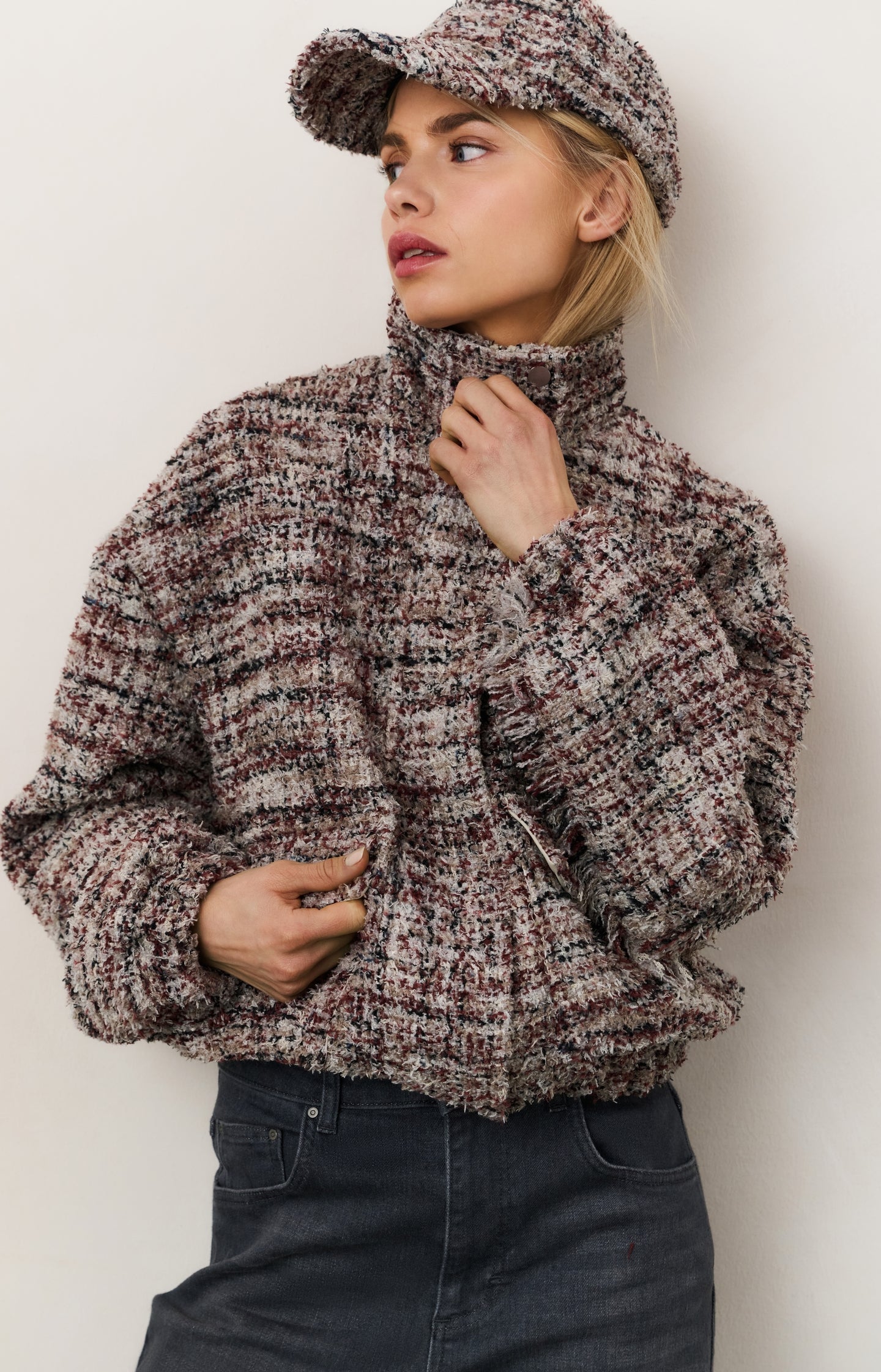 Bouclé jacket with fringes and stand-up collar