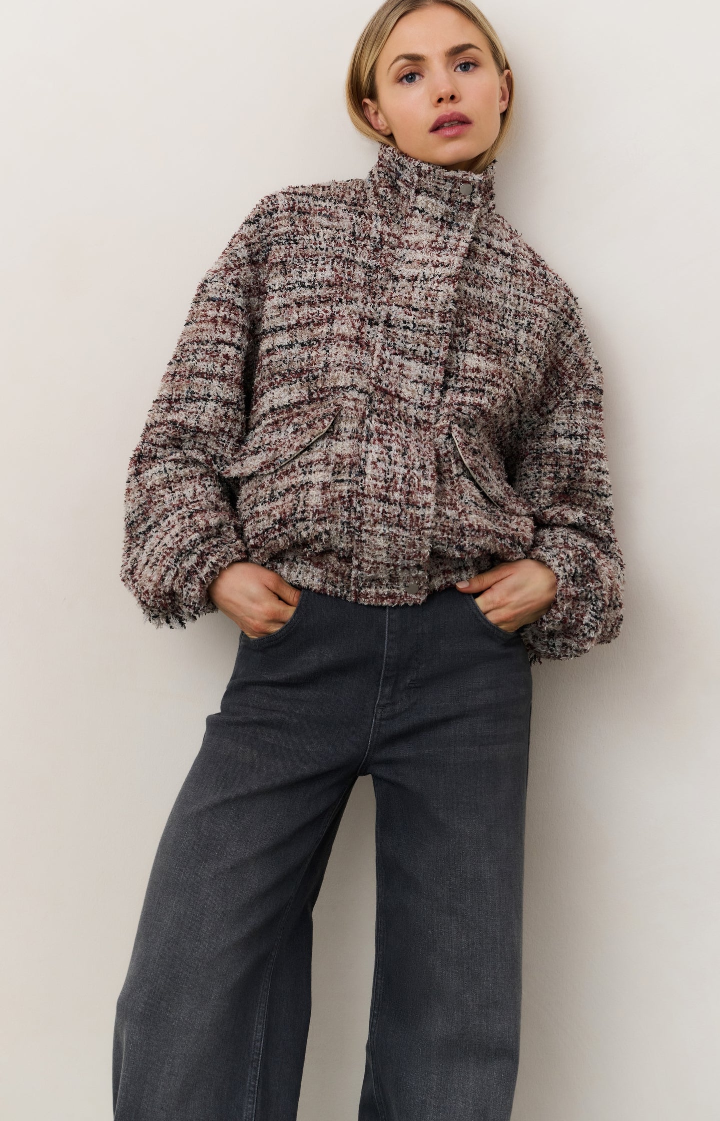 Bouclé jacket with fringes and stand-up collar