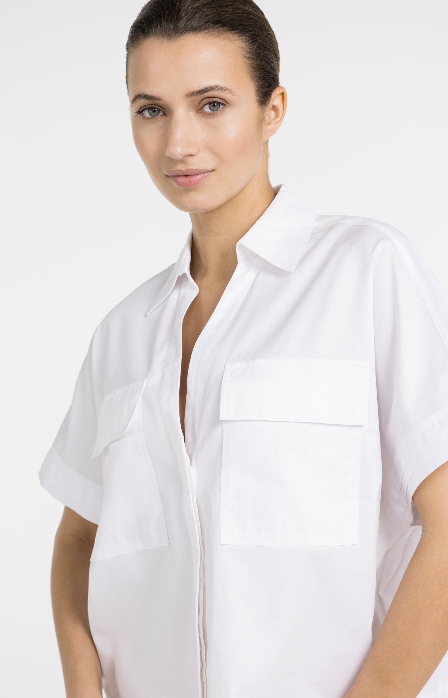 Boxy blouse with chest pockets and pleated sleeves