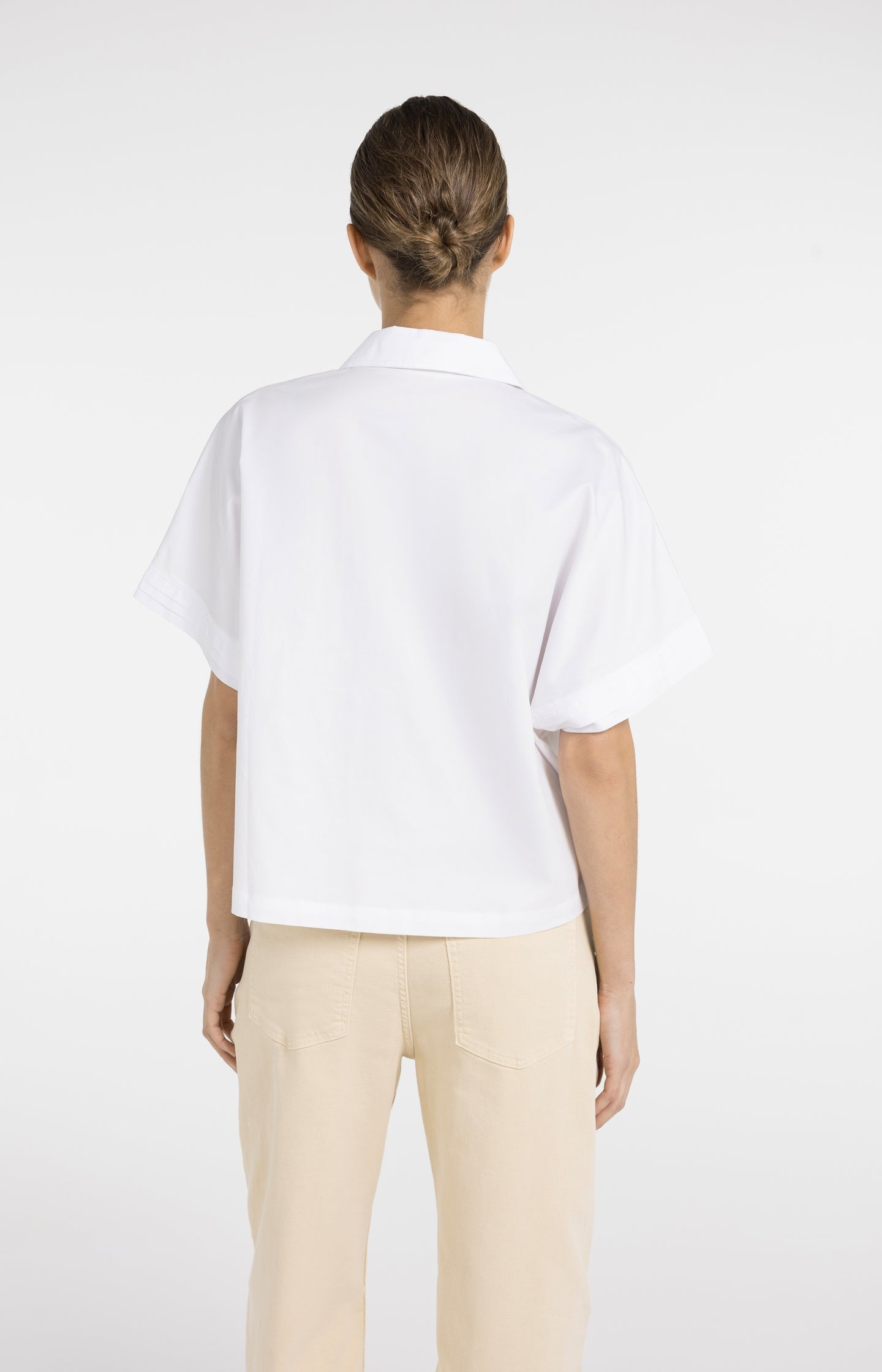 Boxy blouse with chest pockets and pleated sleeves