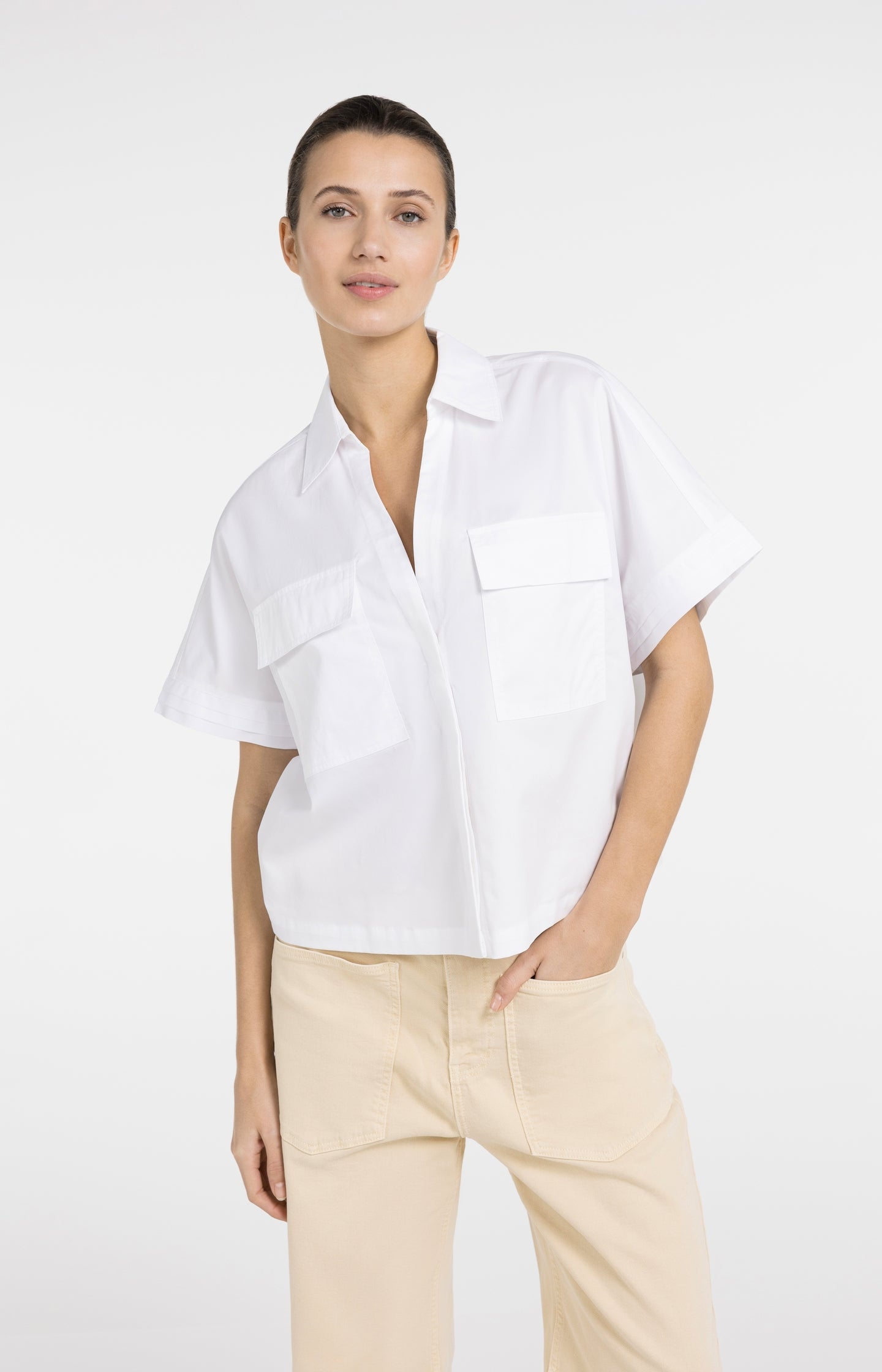Boxy blouse with chest pockets and pleated sleeves