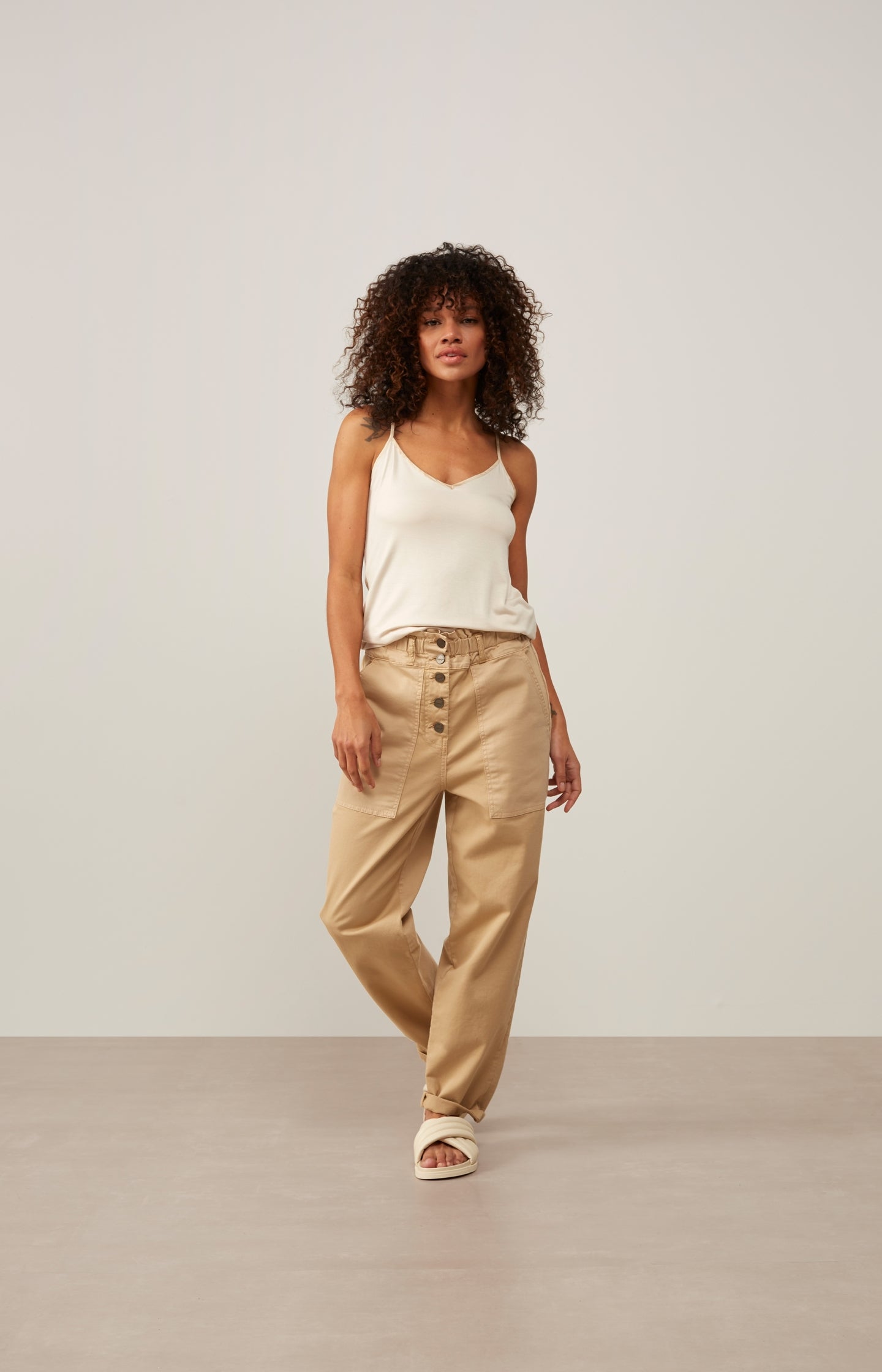 Cargo trousers with paperbag waist, pockets and buttons