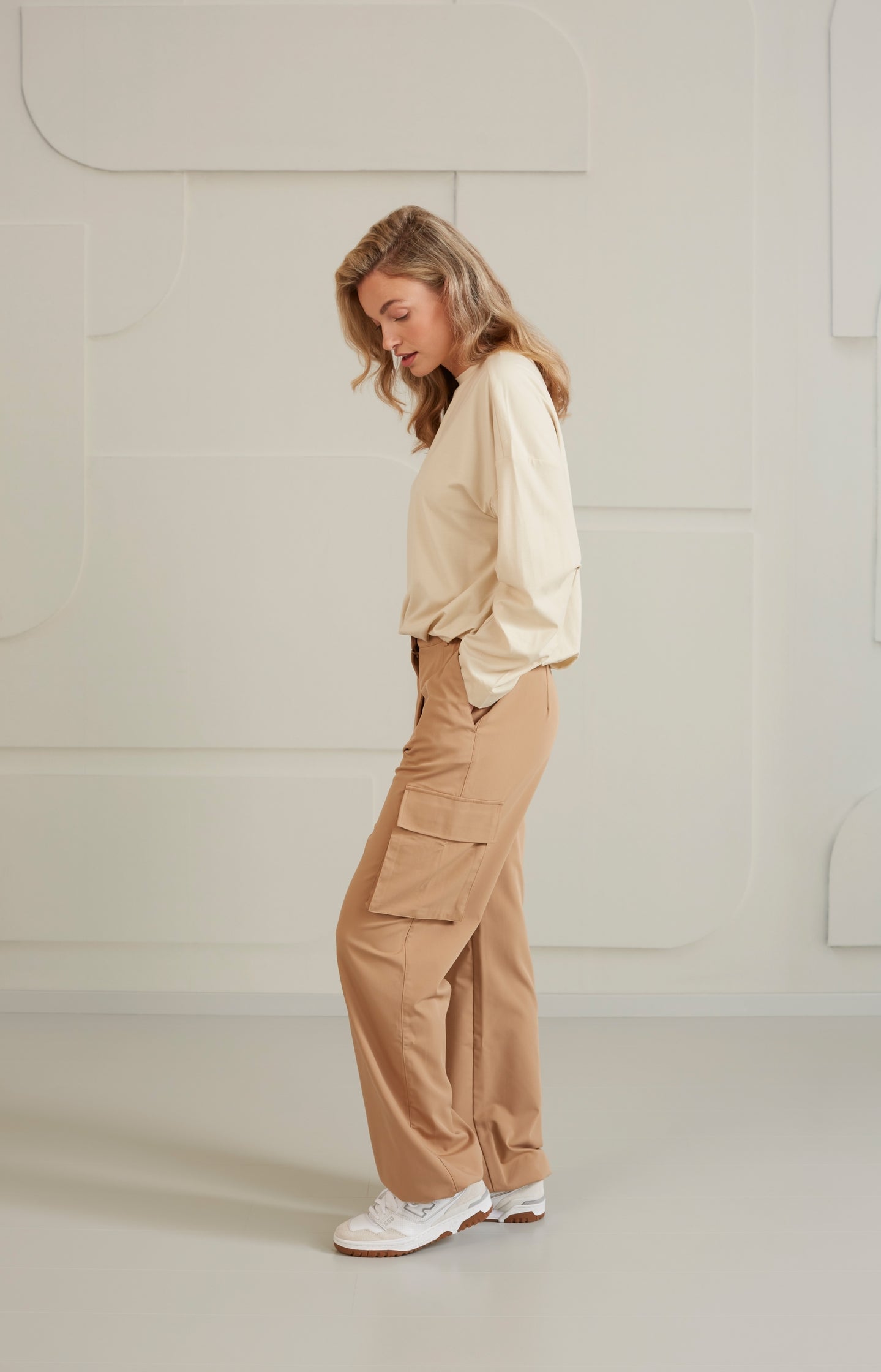 Cargo trousers with wide legs, pockets and waist details