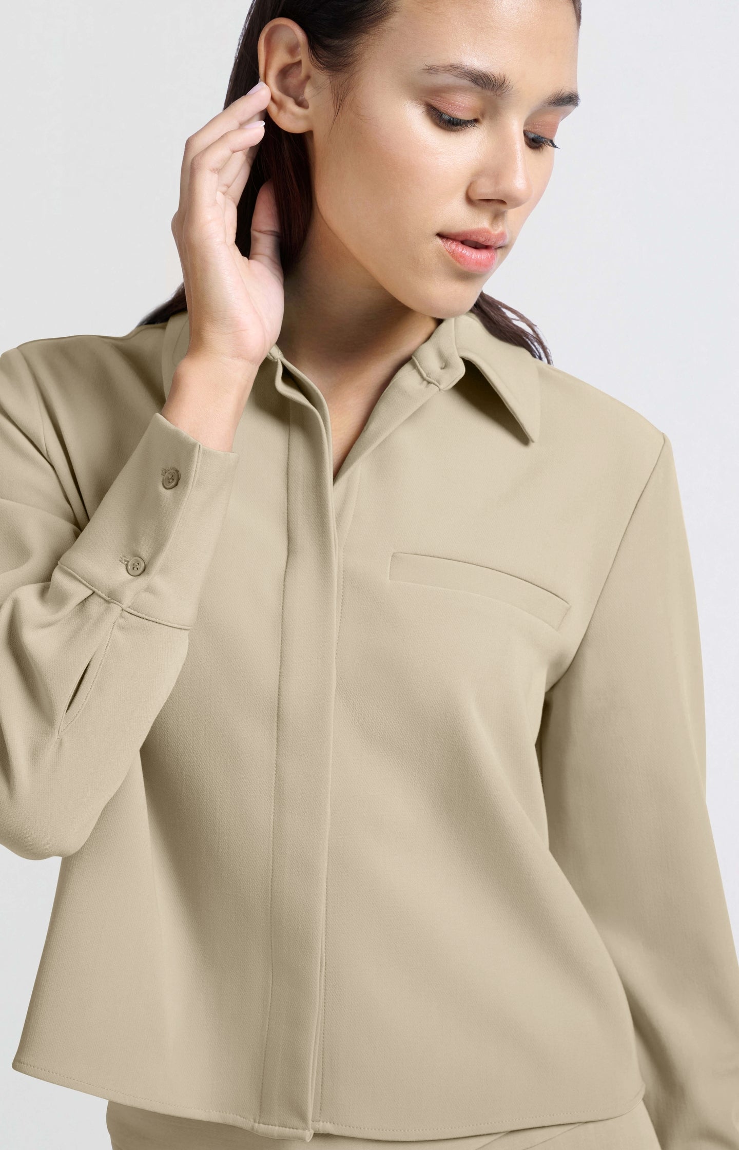 Cropped blouse with long sleeves and chest pocket