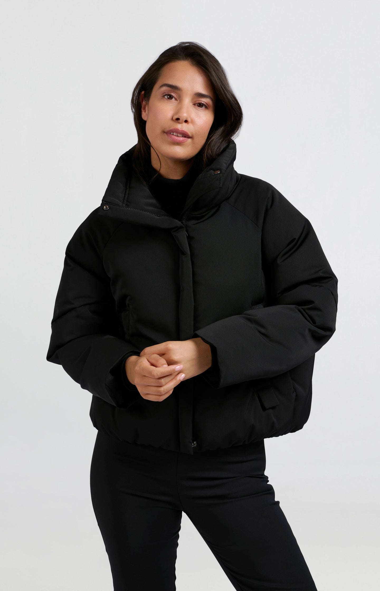 Cropped oversized puffer jacket with high collar and pockets