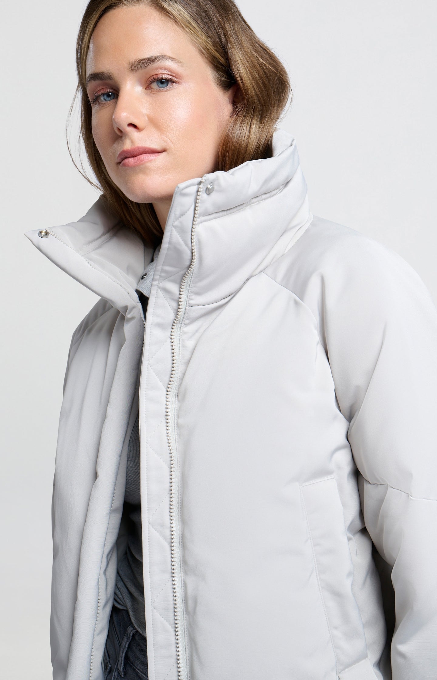 Cropped oversized puffer jacket with high collar and pockets