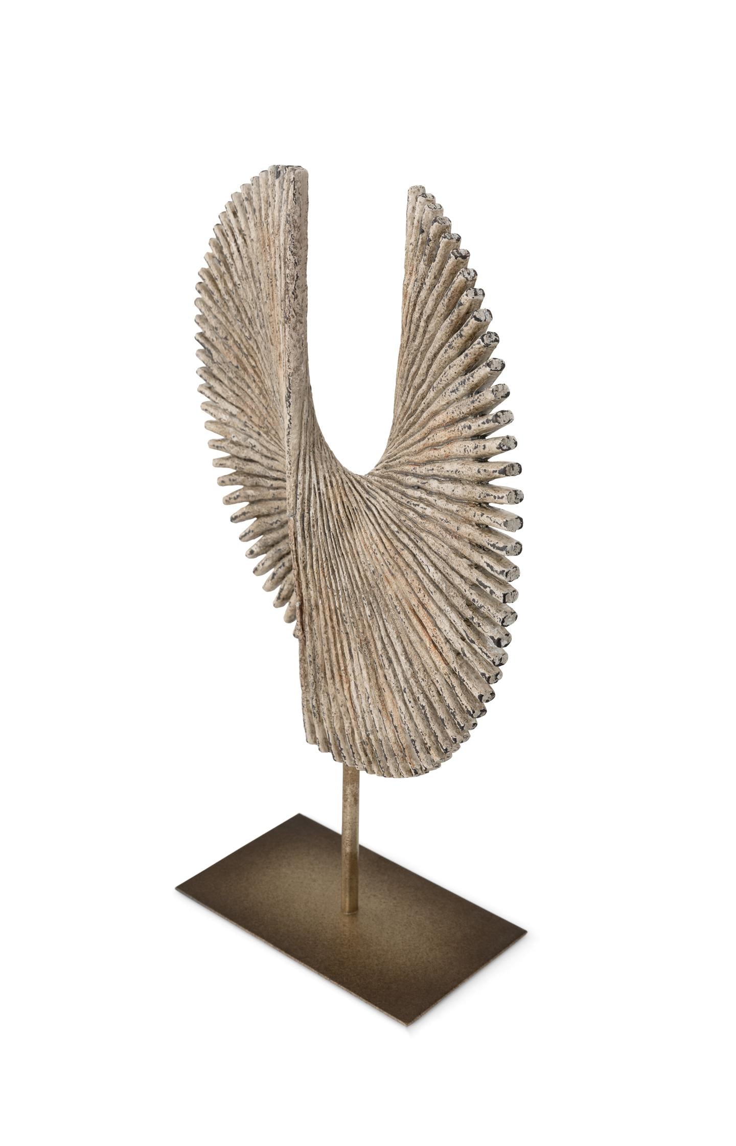 Decorative statue on metal stand