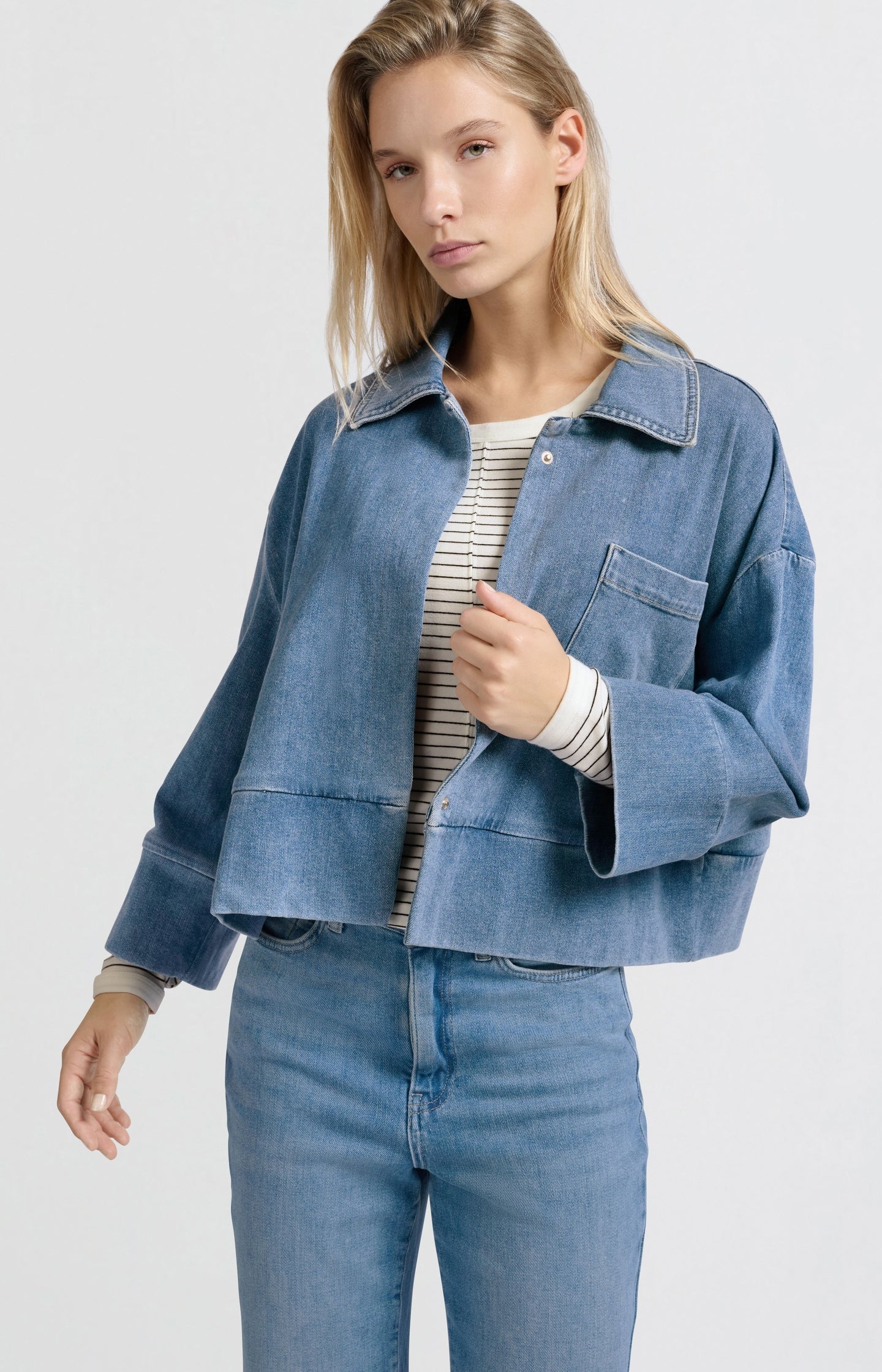 Denim jacket with oversized fit and pocket detail