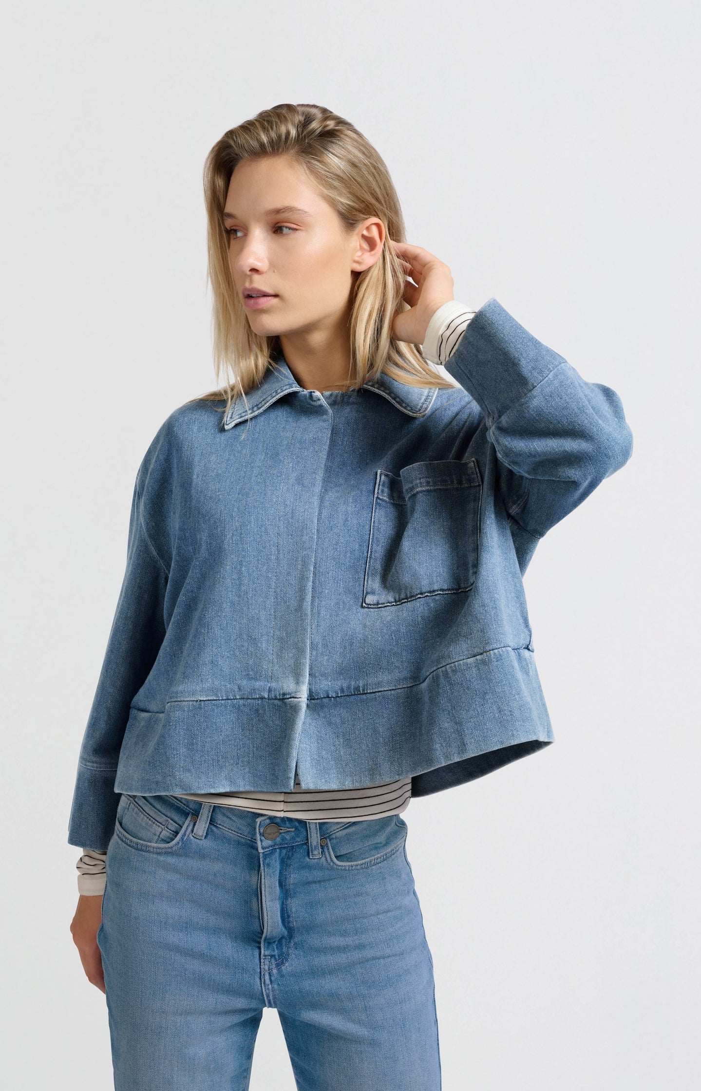 Denim jacket with oversized fit and pocket detail