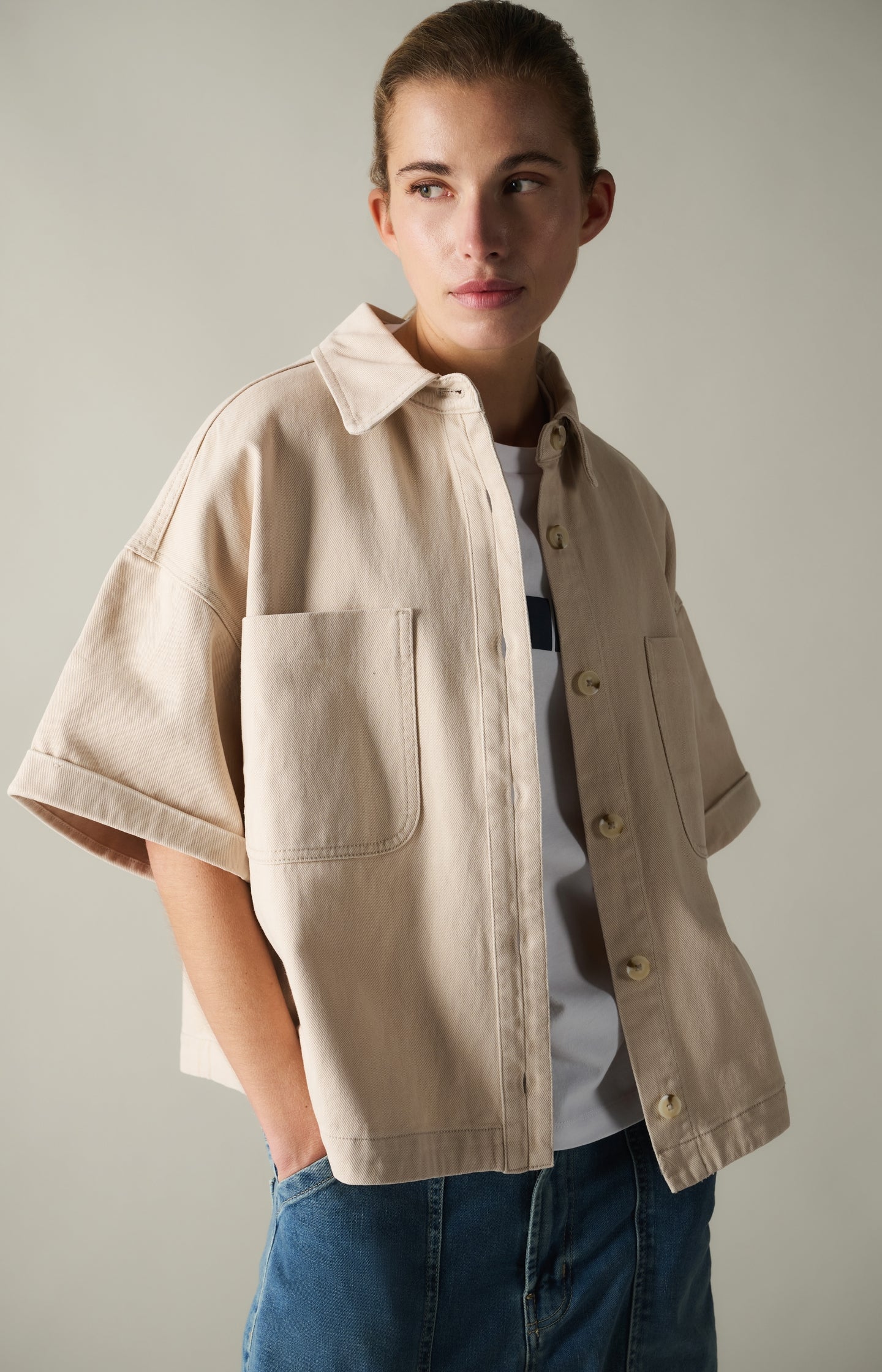 Denim jacket with short sleeves and patch pockets