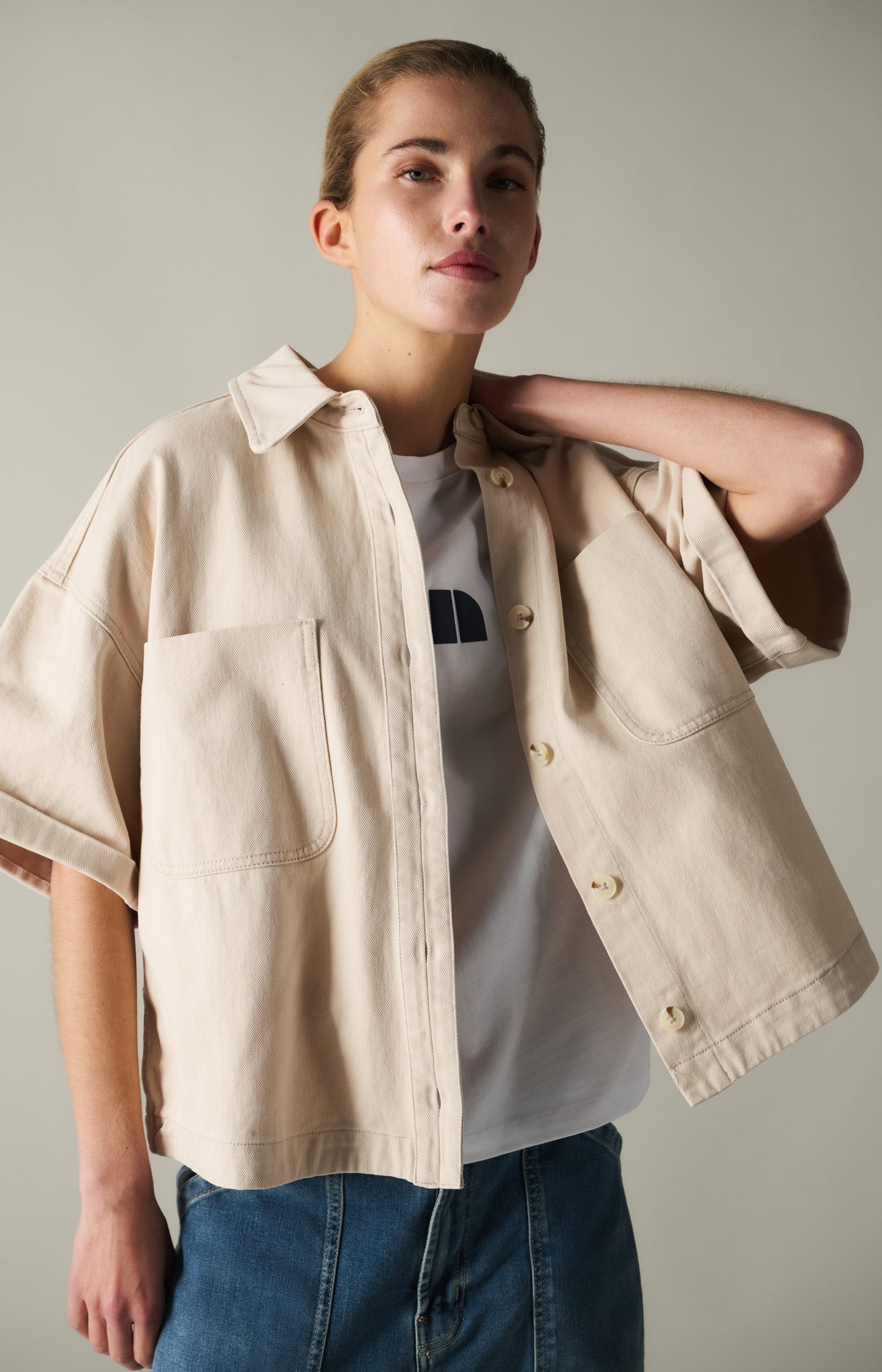 Denim jacket with short sleeves and patch pockets