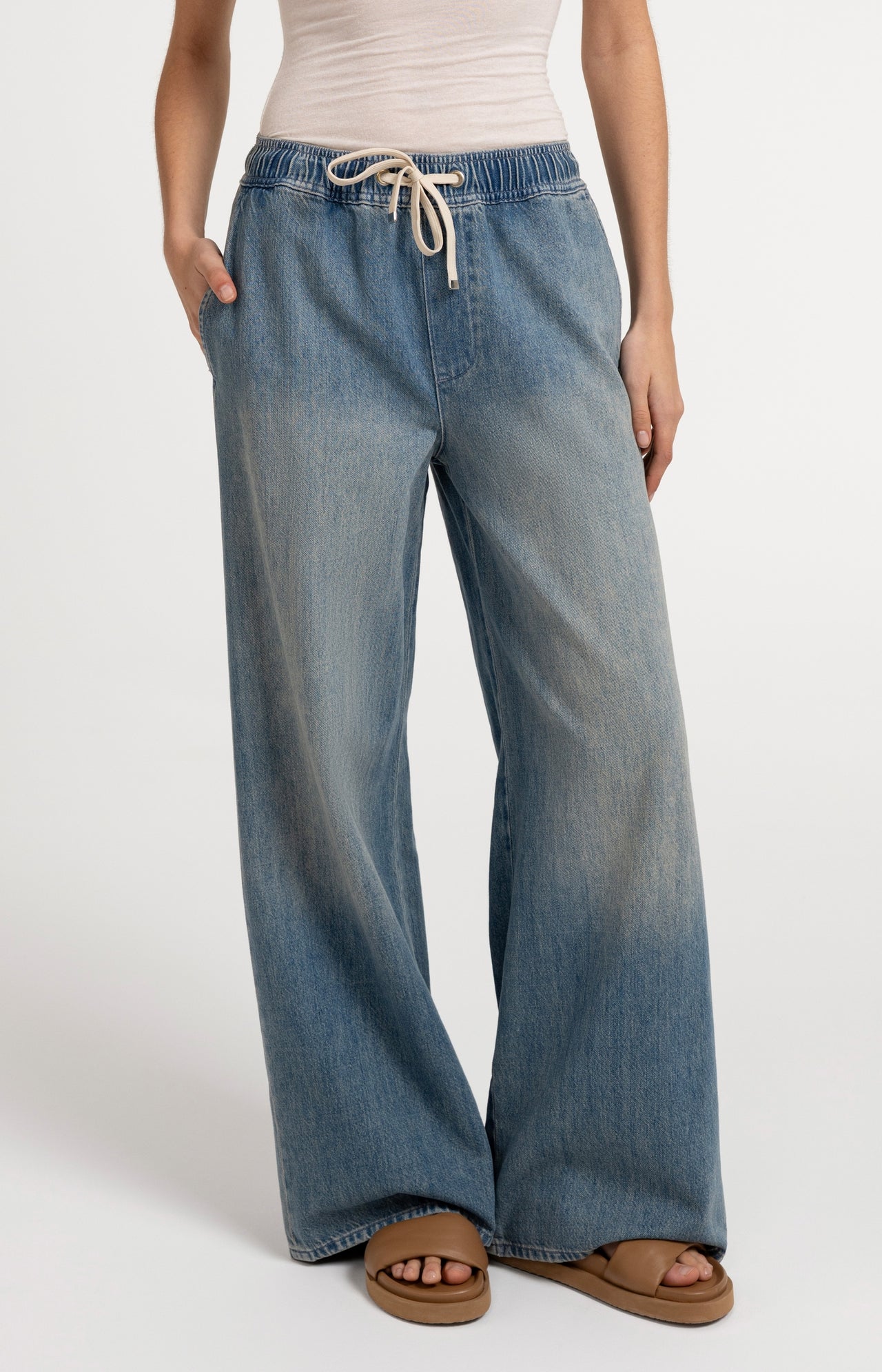 Denim trousers with wide legs and drawstring