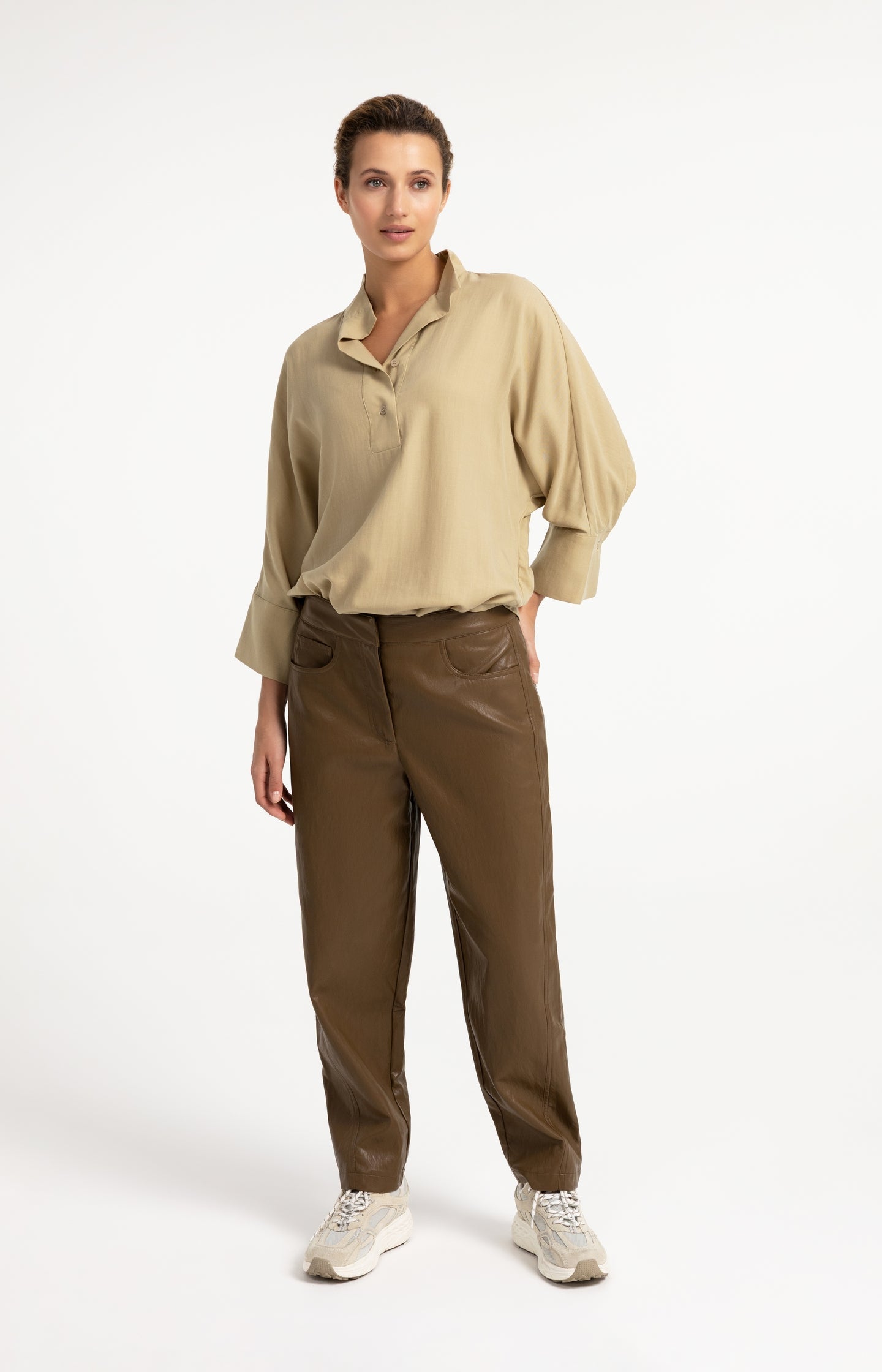 Faux leather carrot fit trousers