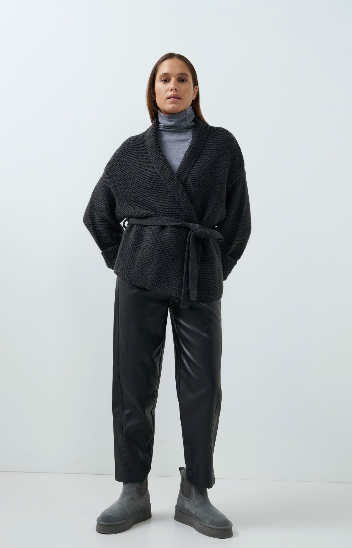 Faux leather carrot fit trousers