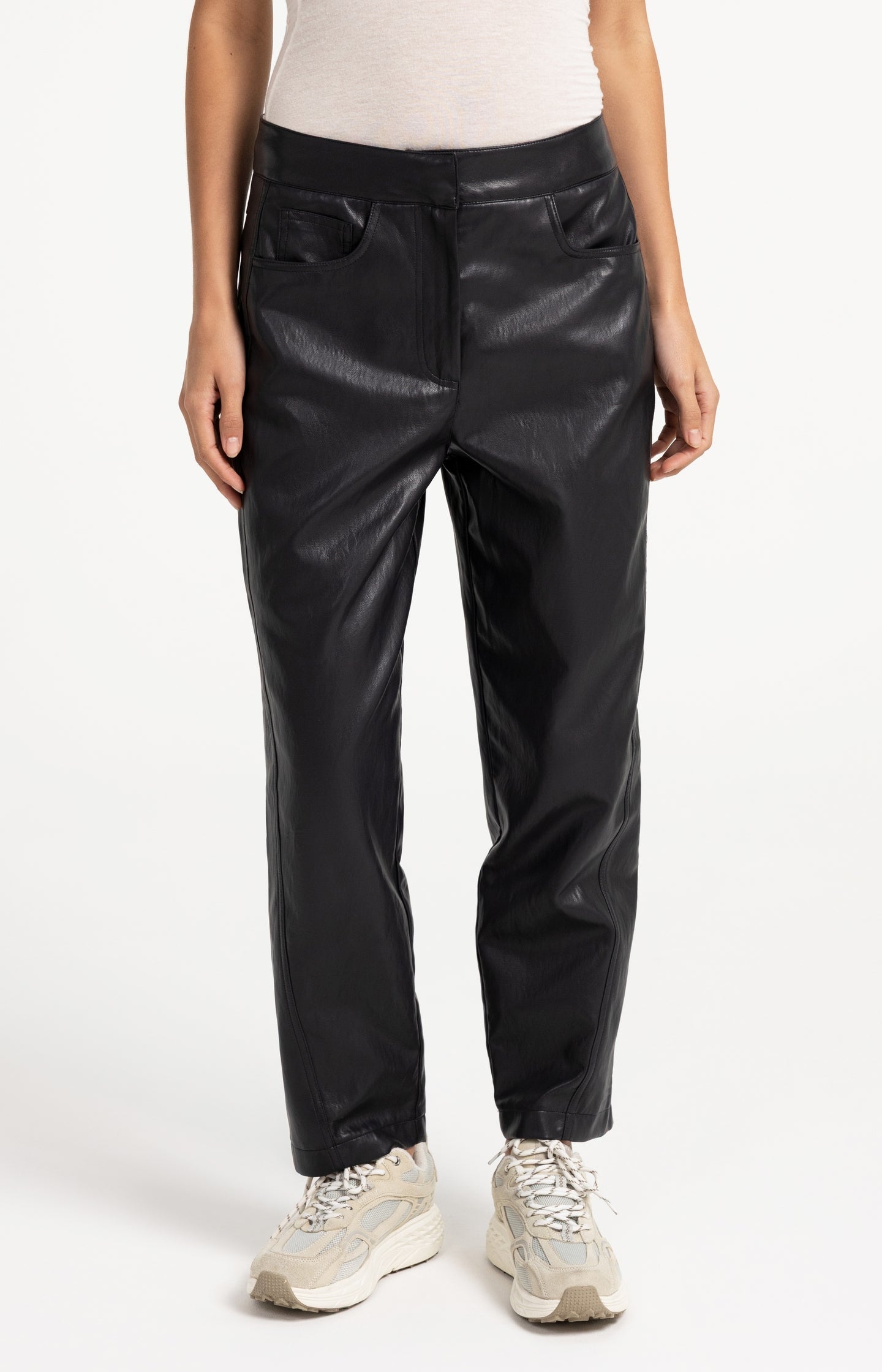 Faux leather carrot fit trousers with seam detail
