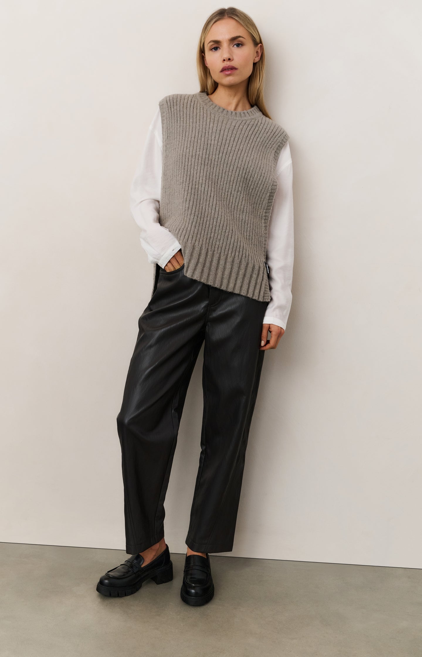 Faux leather trousers with seam details