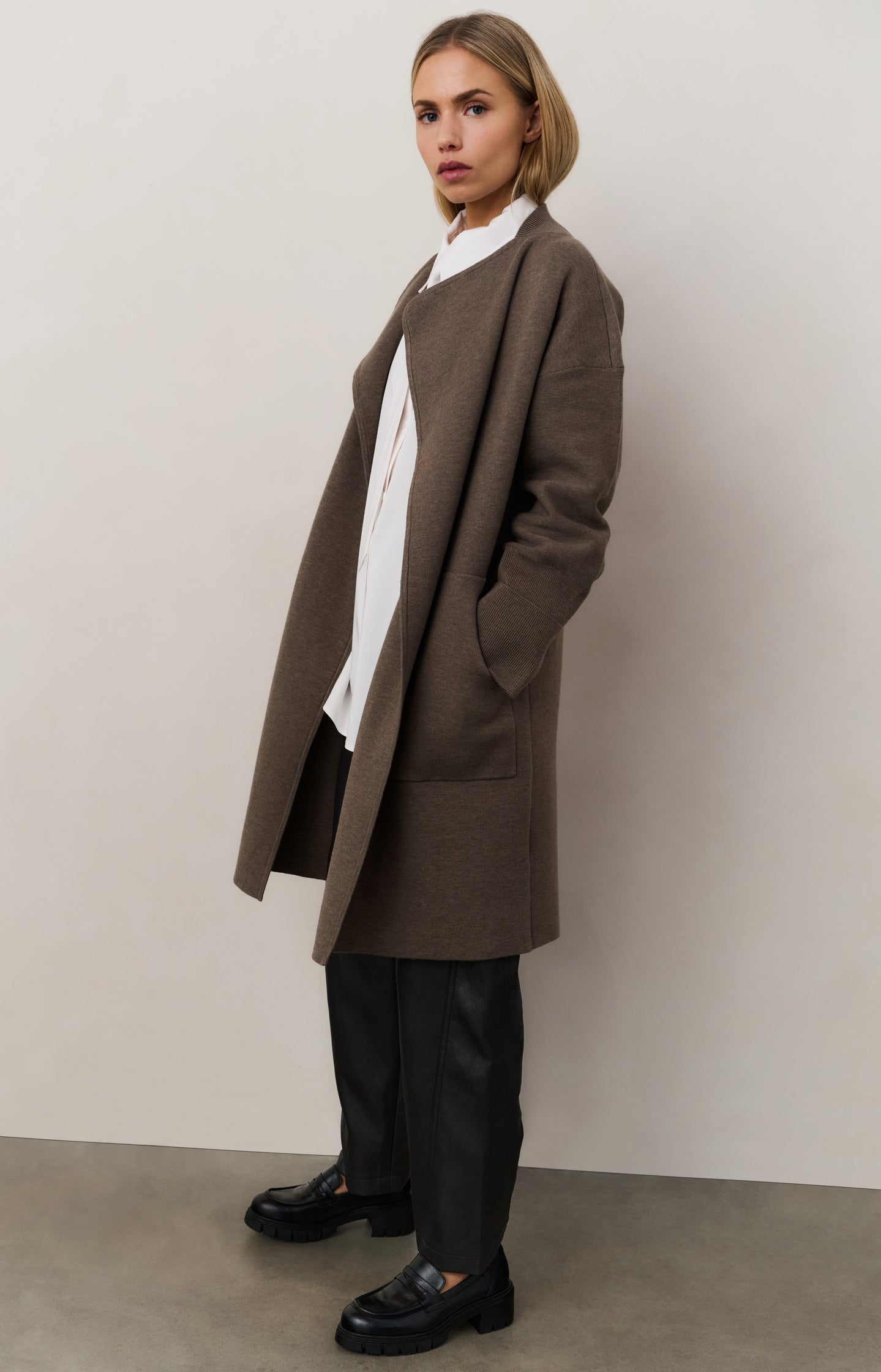 Faux leather trousers with seam details