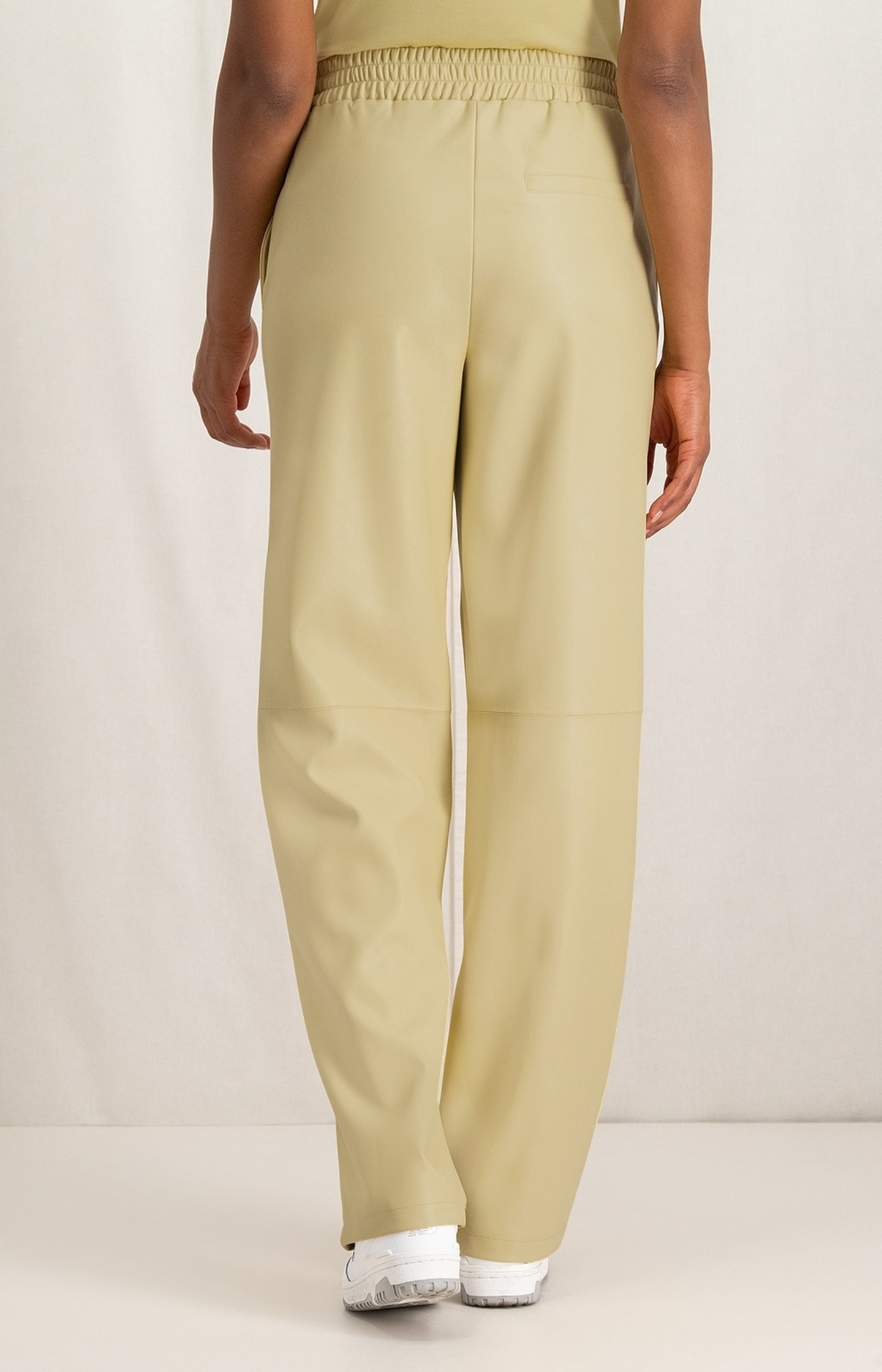 Faux leather wide leg trousers with elastic waist and pocket