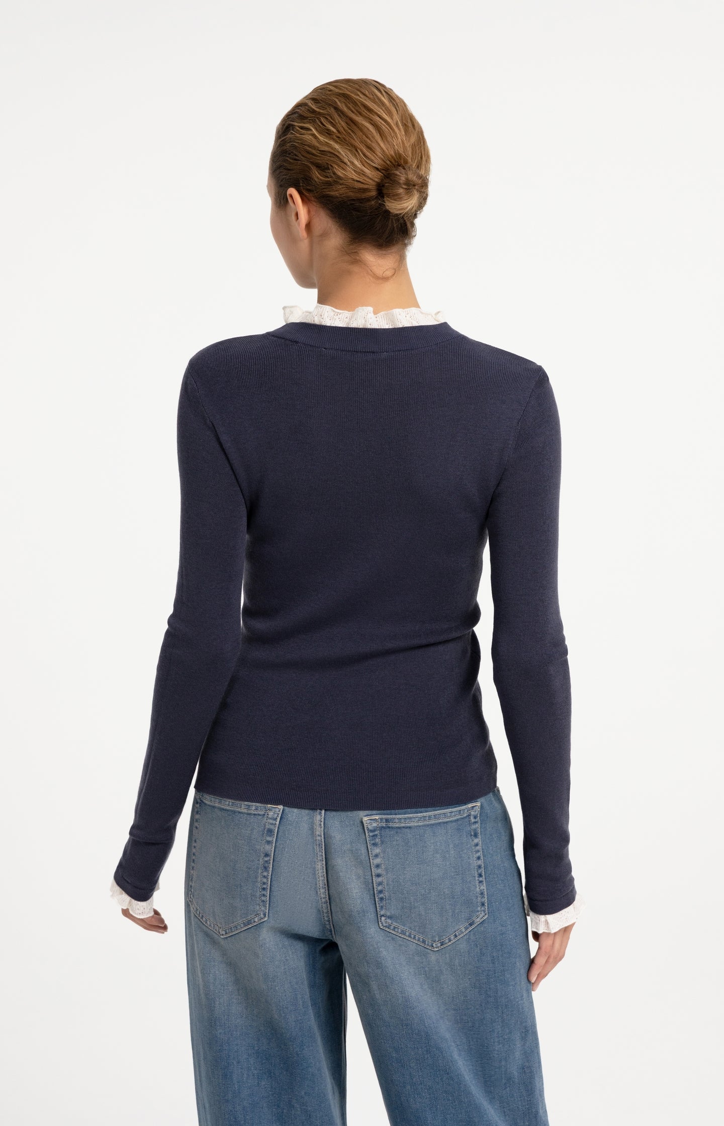 Fine knit rib top with ruffle details