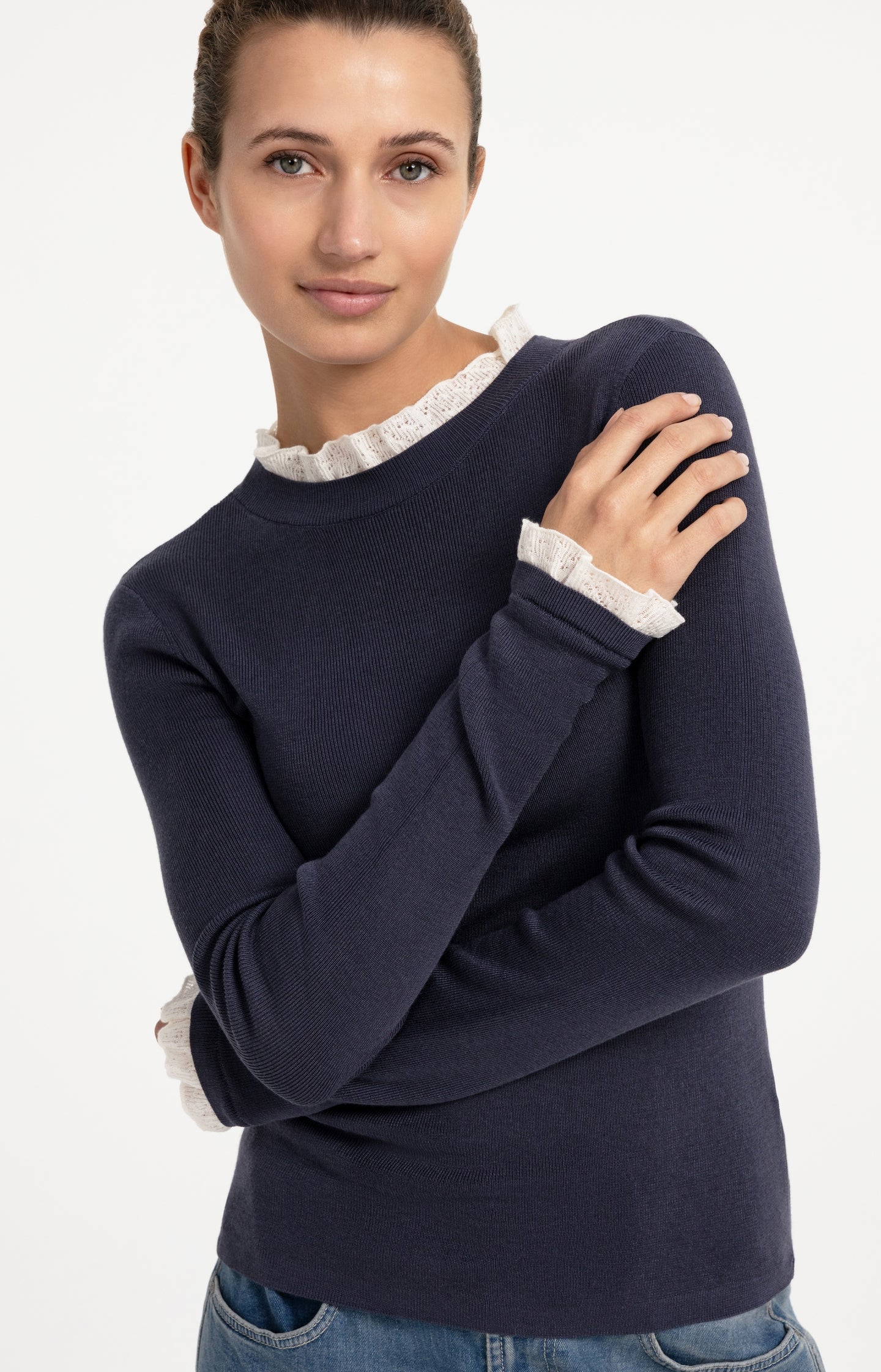 Fine knit rib top with ruffle details
