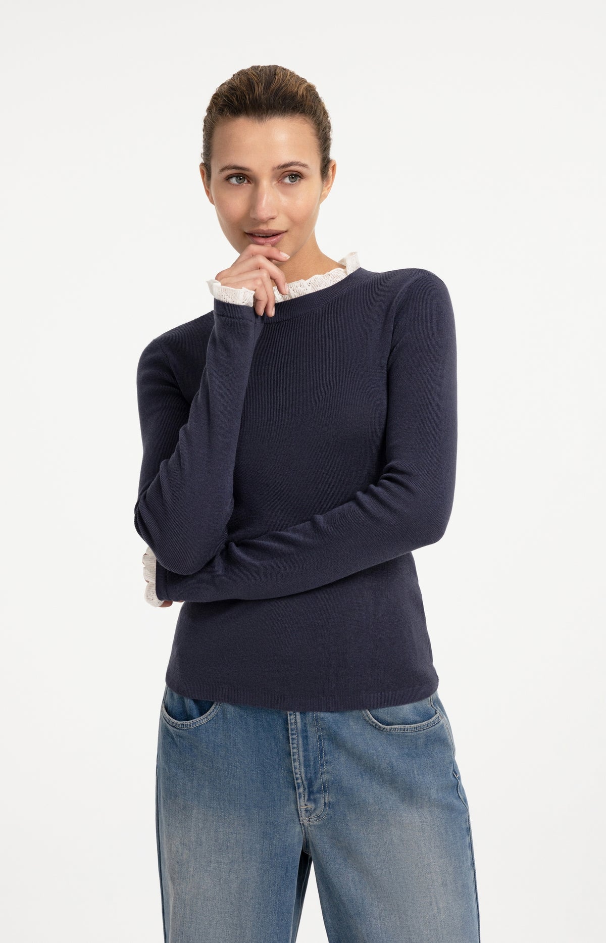 Fine knit rib top with ruffle details