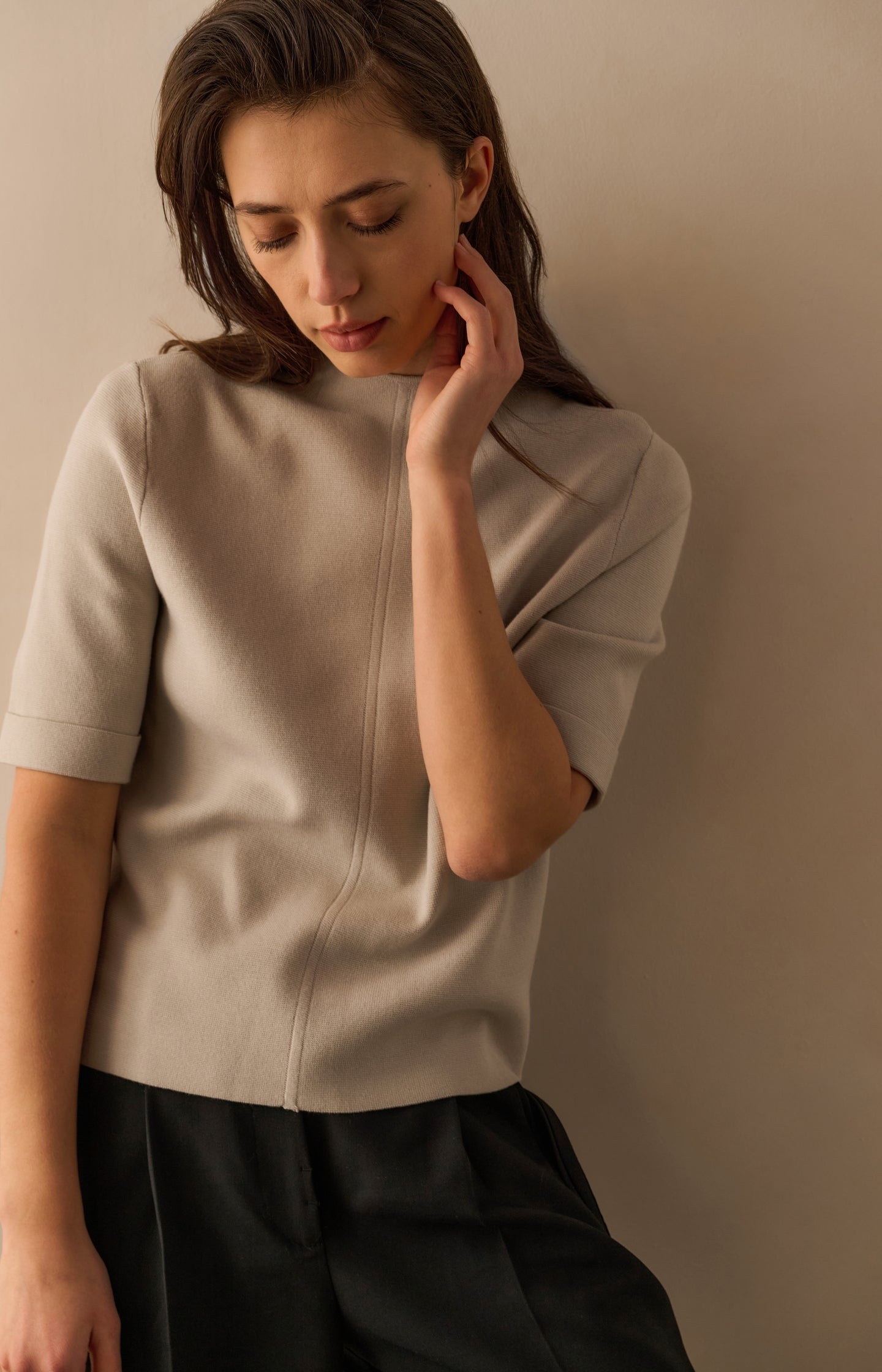 Fine knit sweater with back button detail and short sleeves
