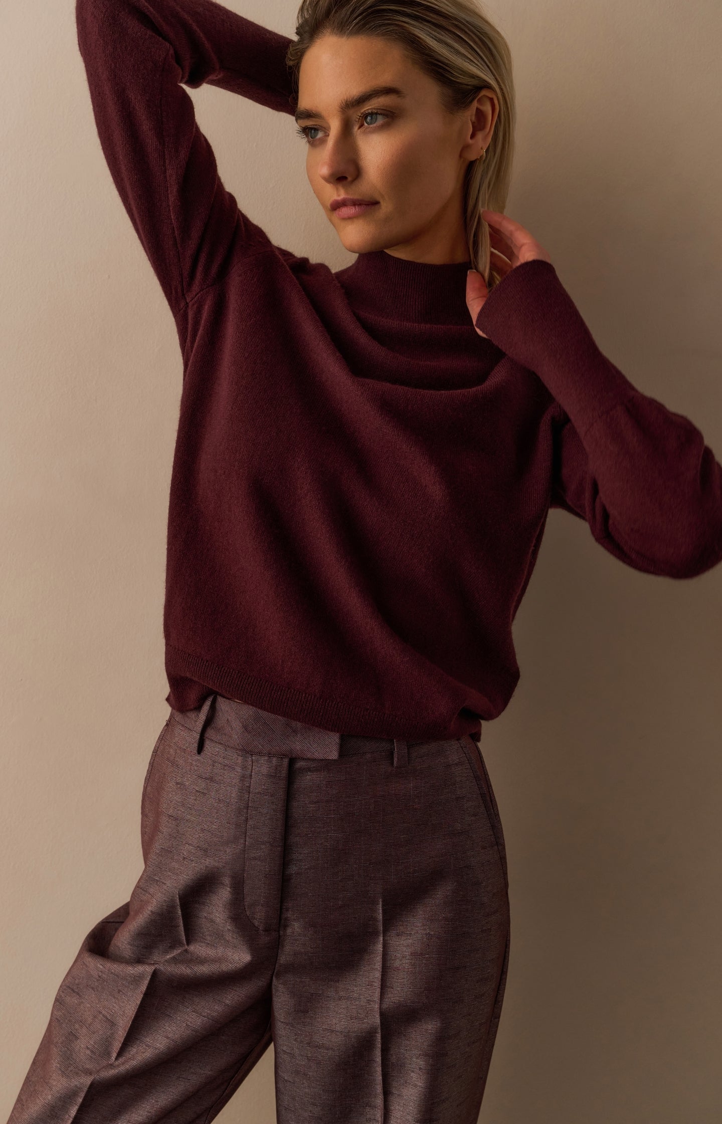 Fine knit sweater with mock neck and cut-out neckline