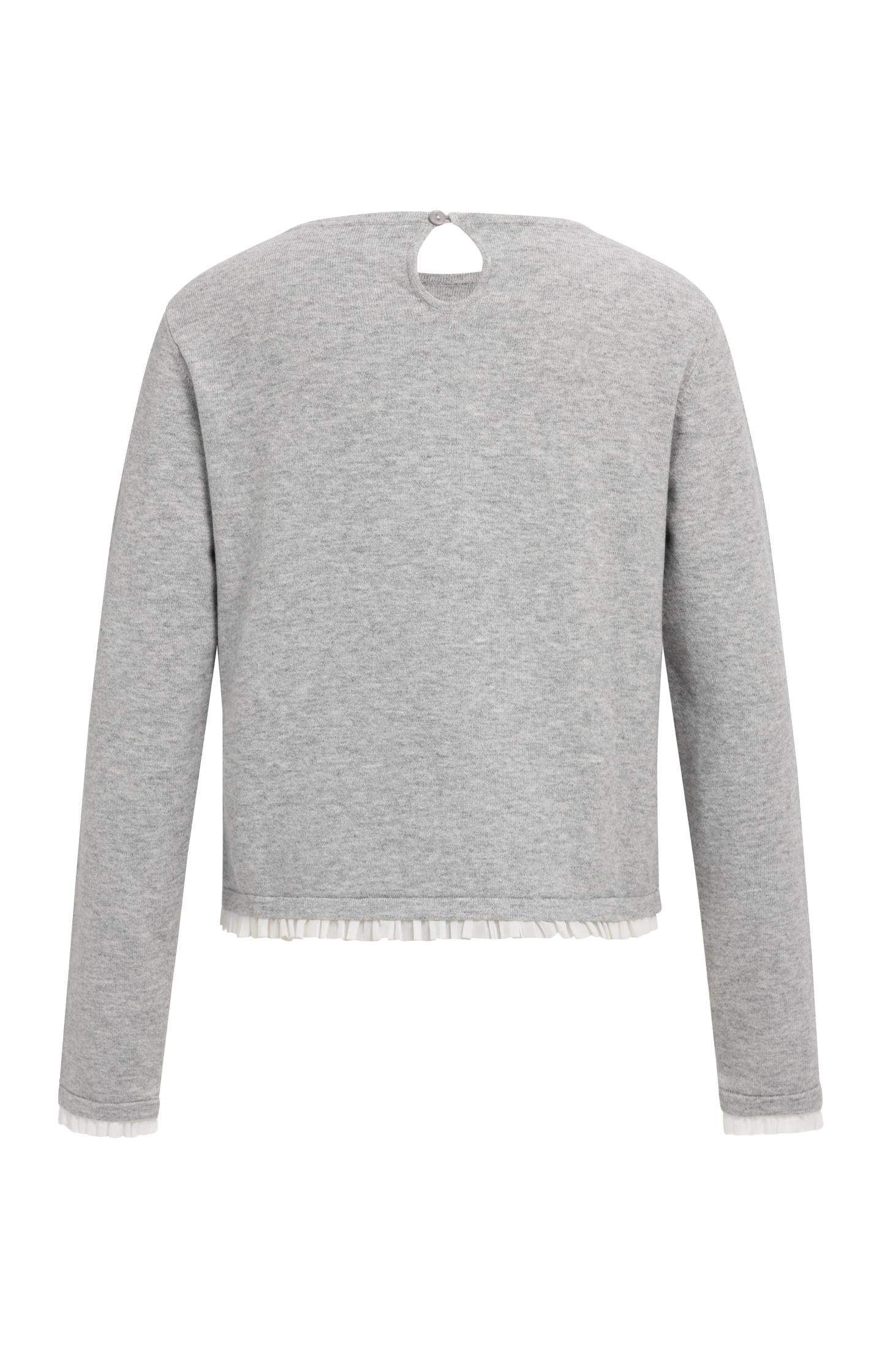 Fine knit top with woven ruffle trims