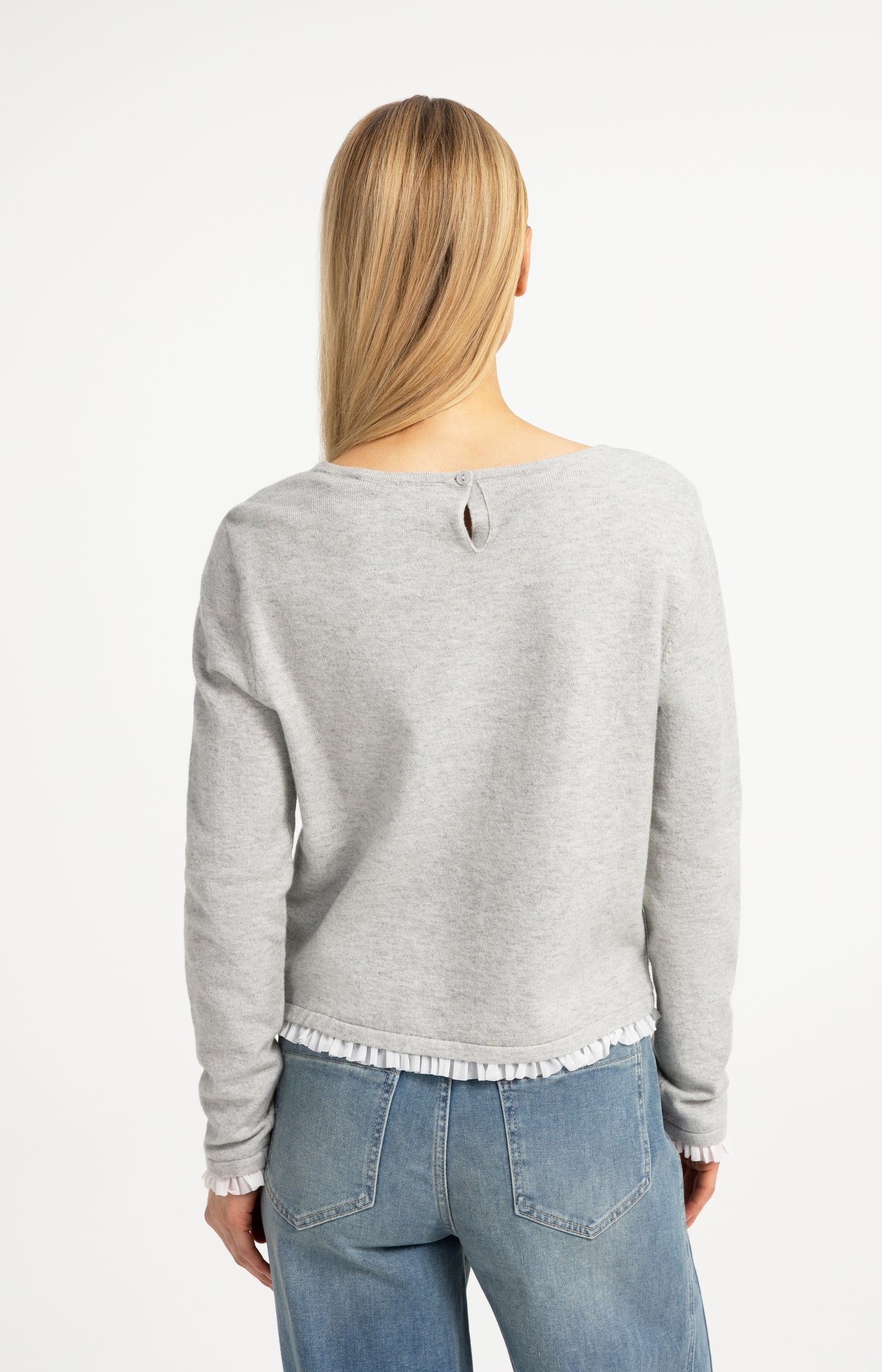 Fine knit top with woven ruffle trims