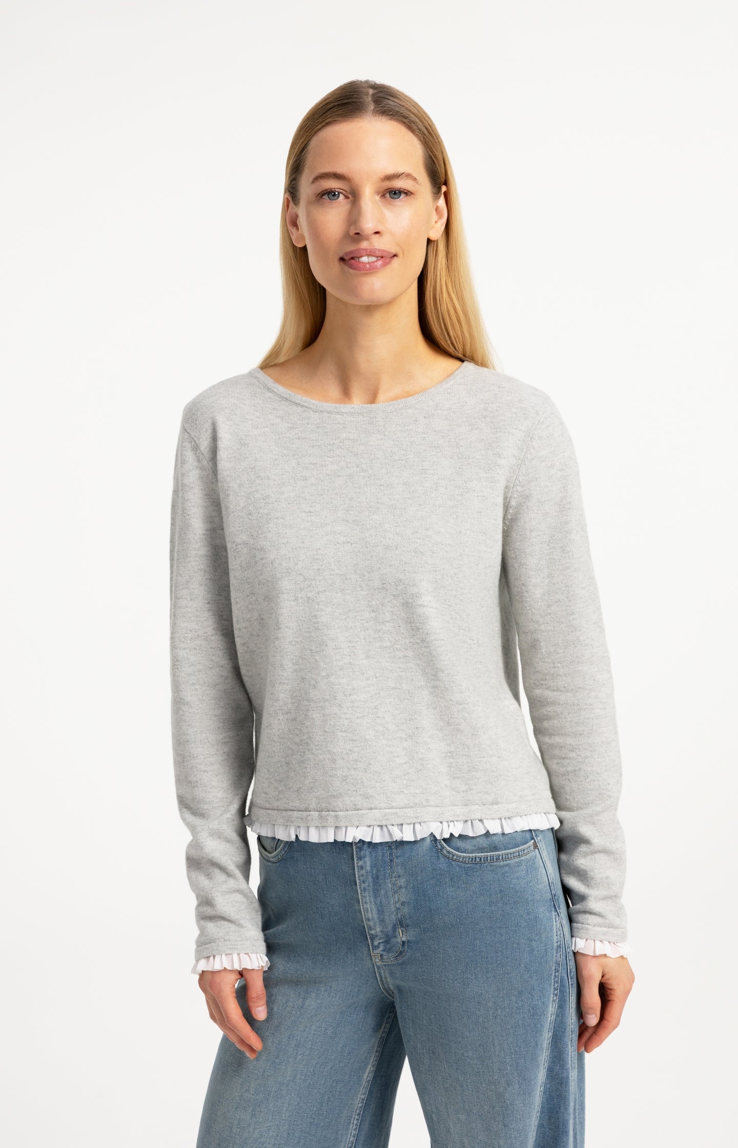 Fine knit top with woven ruffle trims