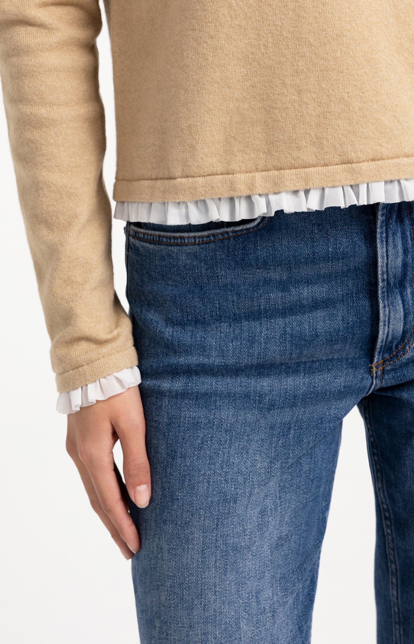 Fine knit top with woven ruffle trims