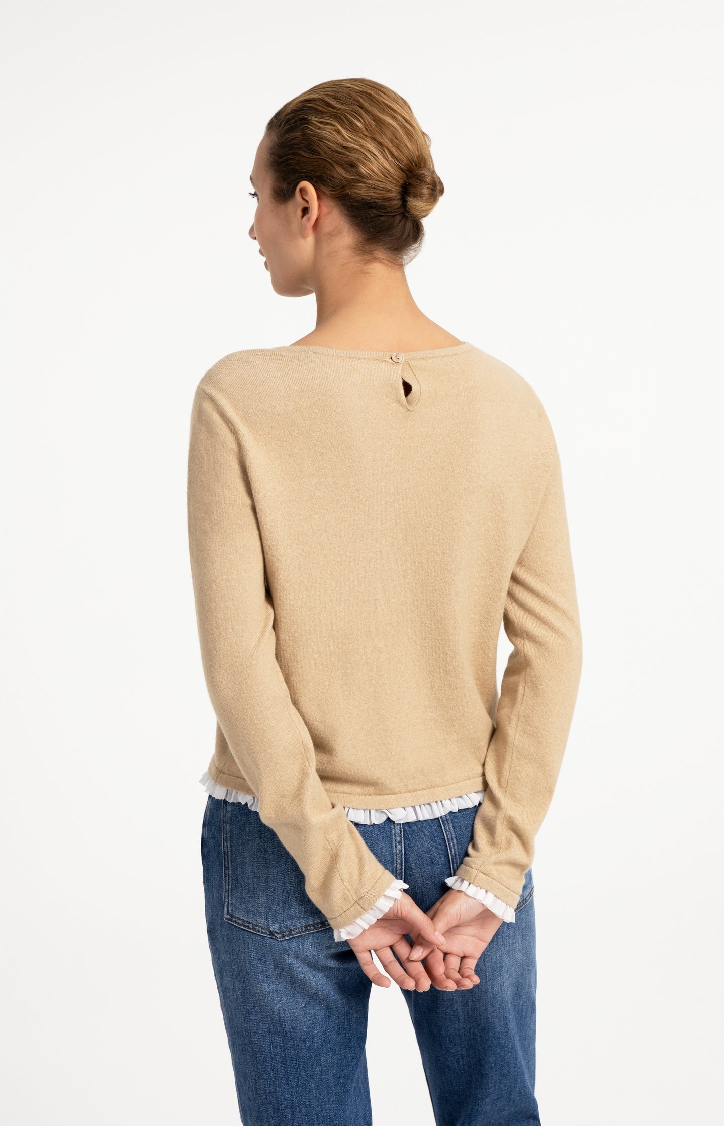 Fine knit top with woven ruffle trims