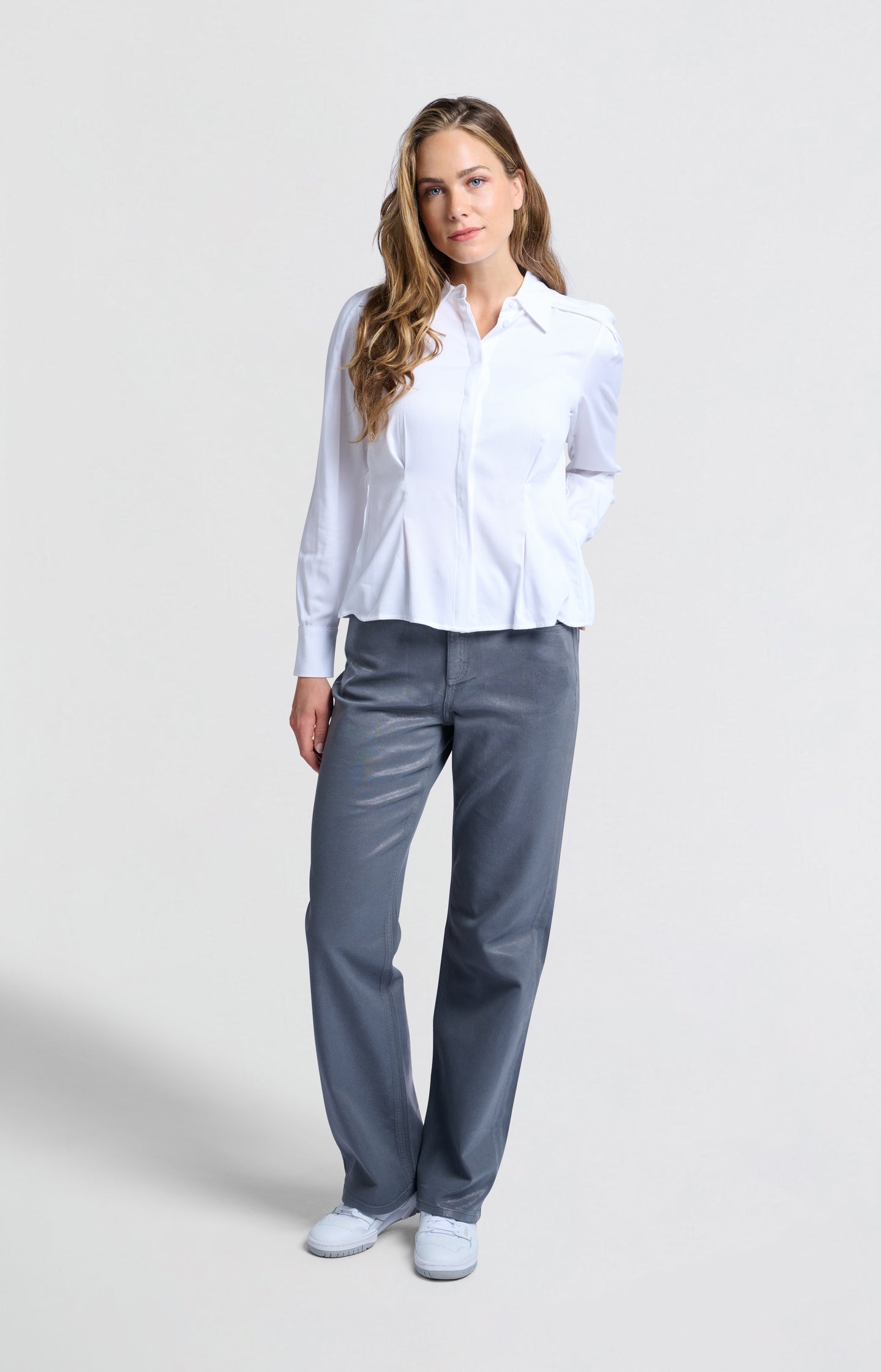 Fitted blouse with long sleeves and shoulder accents