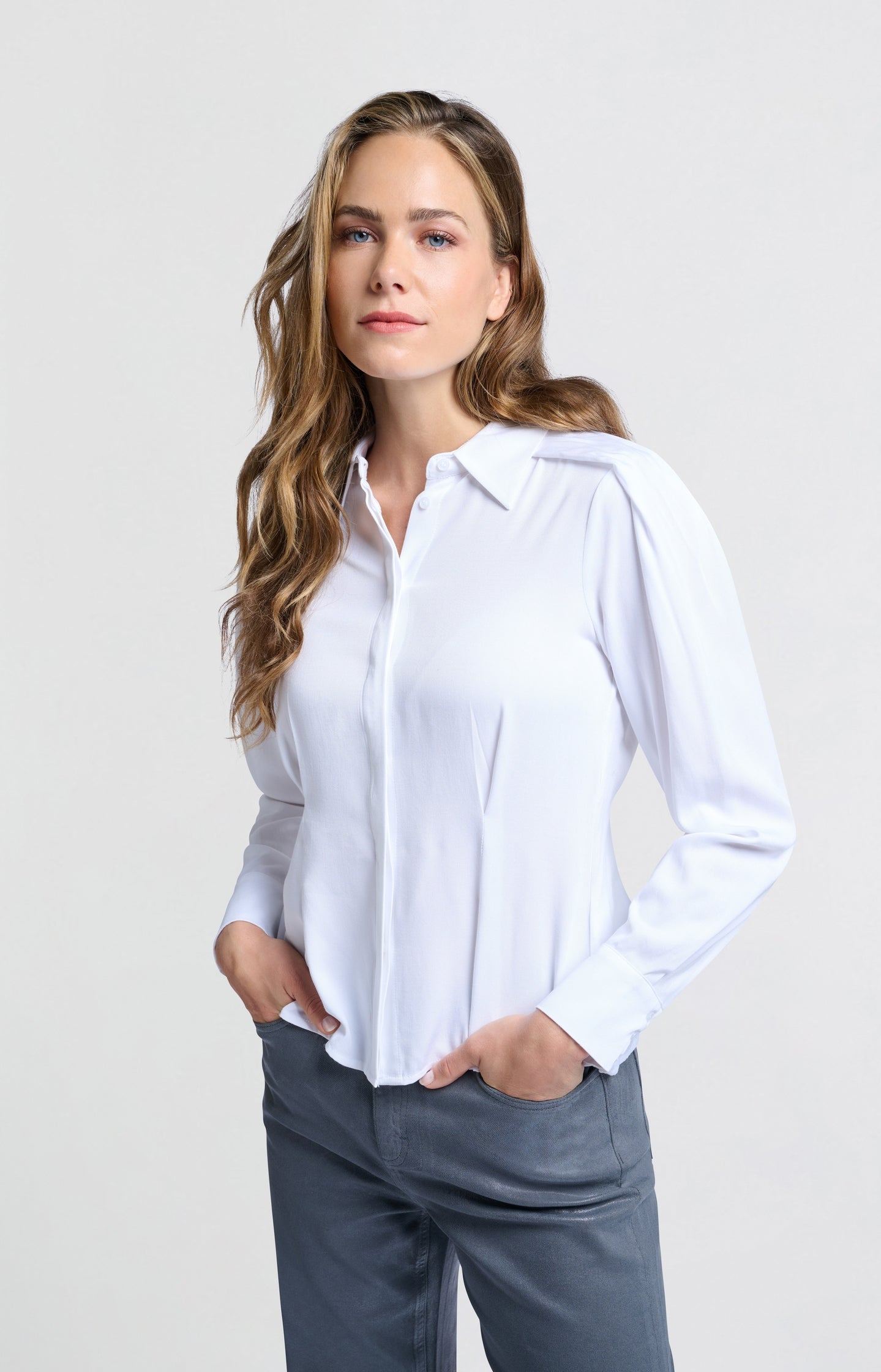 Fitted blouse with long sleeves and shoulder accents