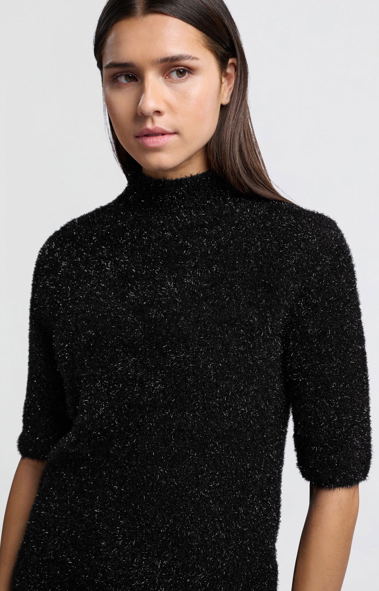 Fluffy sweater with half-length sleeves and a collar