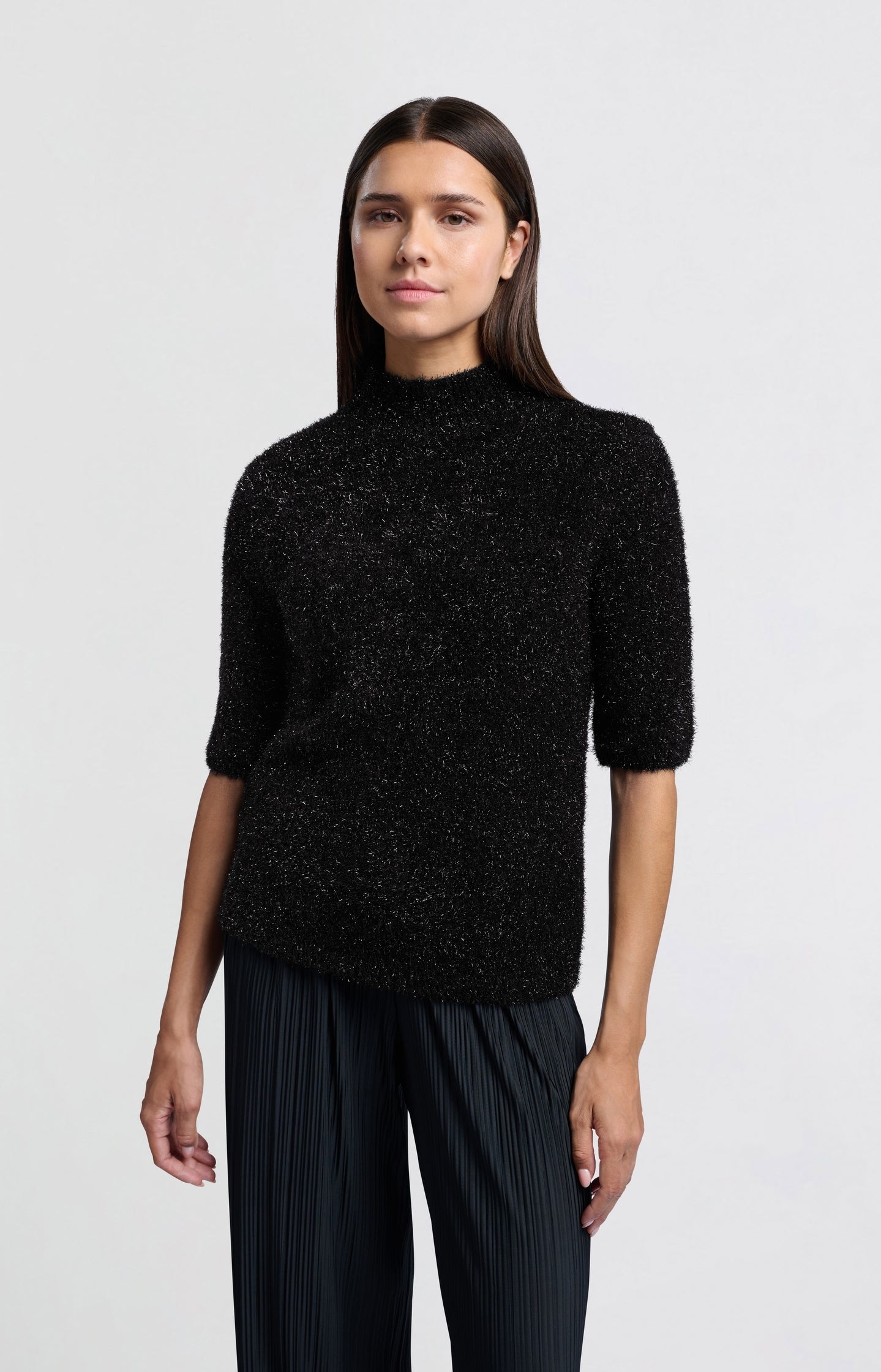 Fluffy sweater with half-length sleeves and a collar