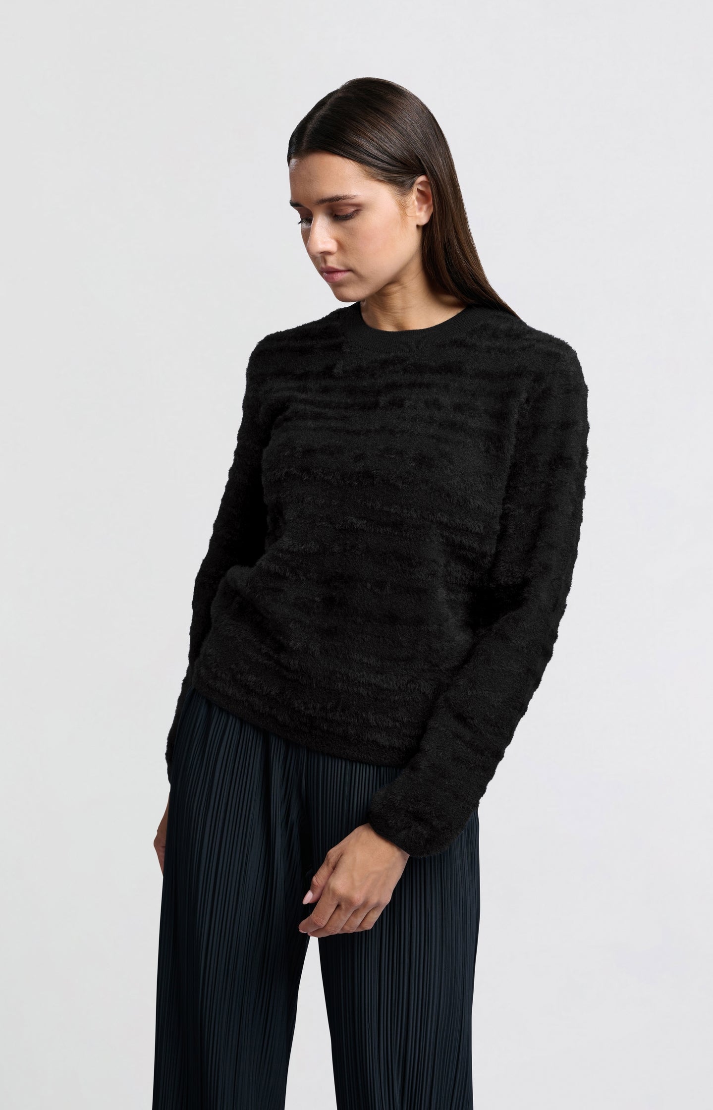 Fluffy sweater with round neckline and subtle stripes