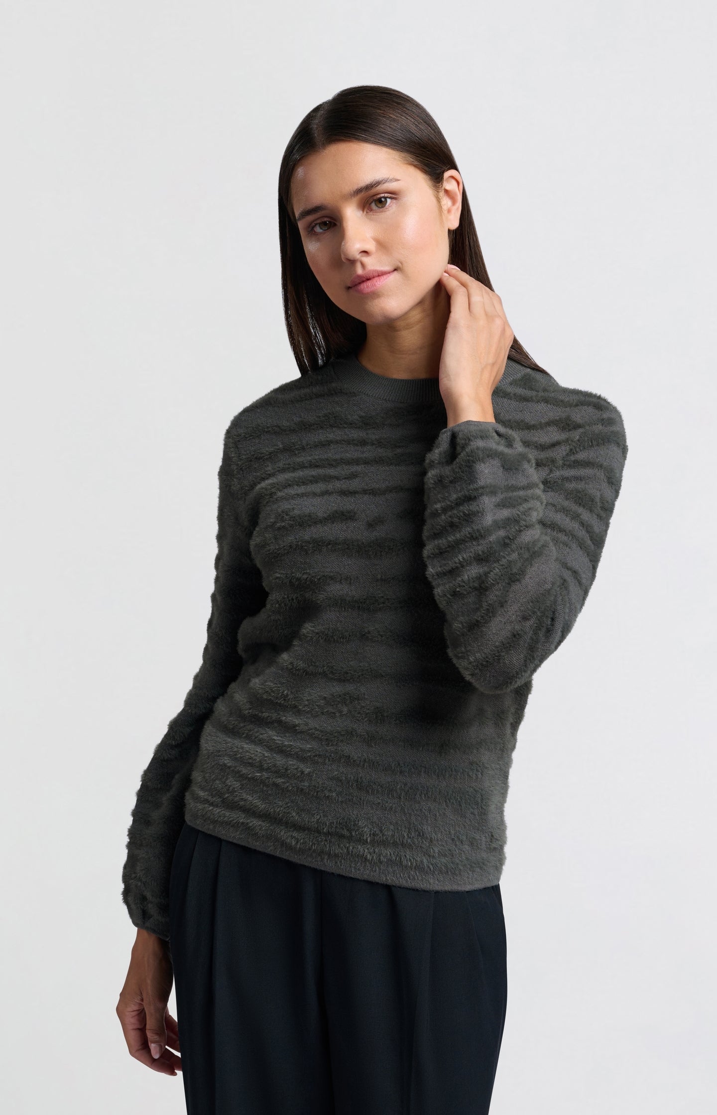 Fluffy sweater with round neckline and subtle stripes