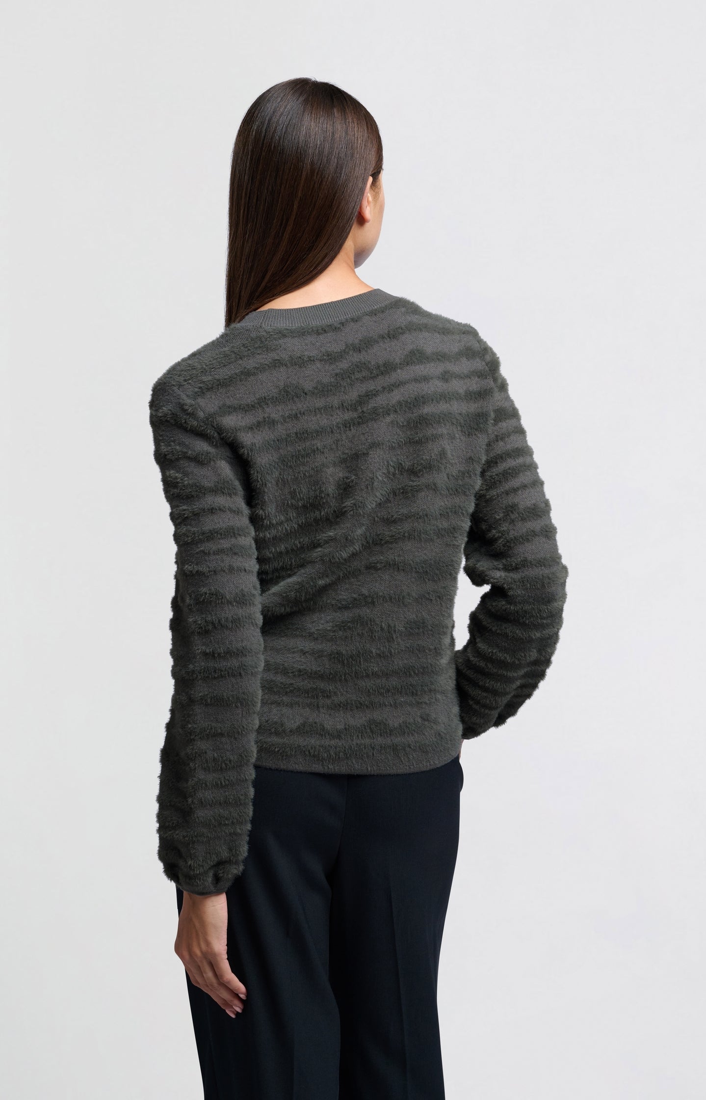 Fluffy sweater with round neckline and subtle stripes