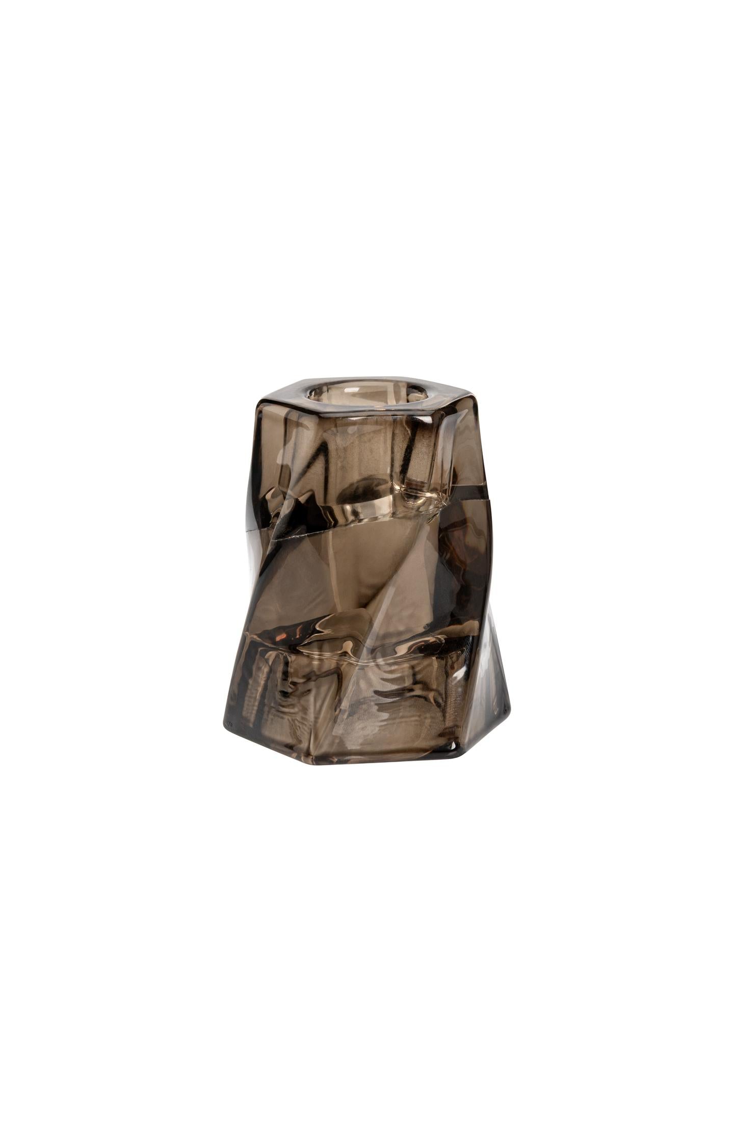 Glass candle holder with swirl design