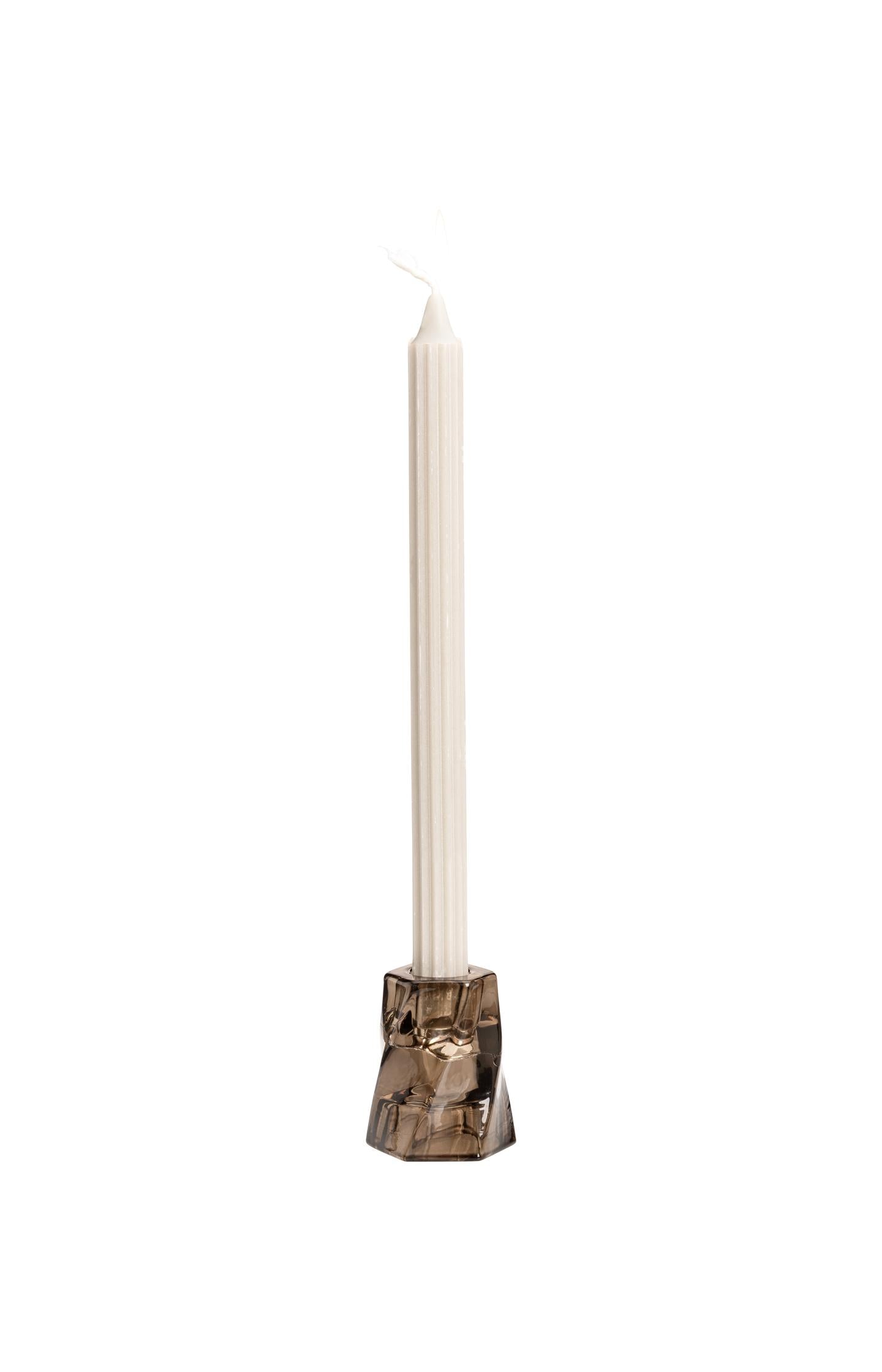 Glass candle holder with swirl design